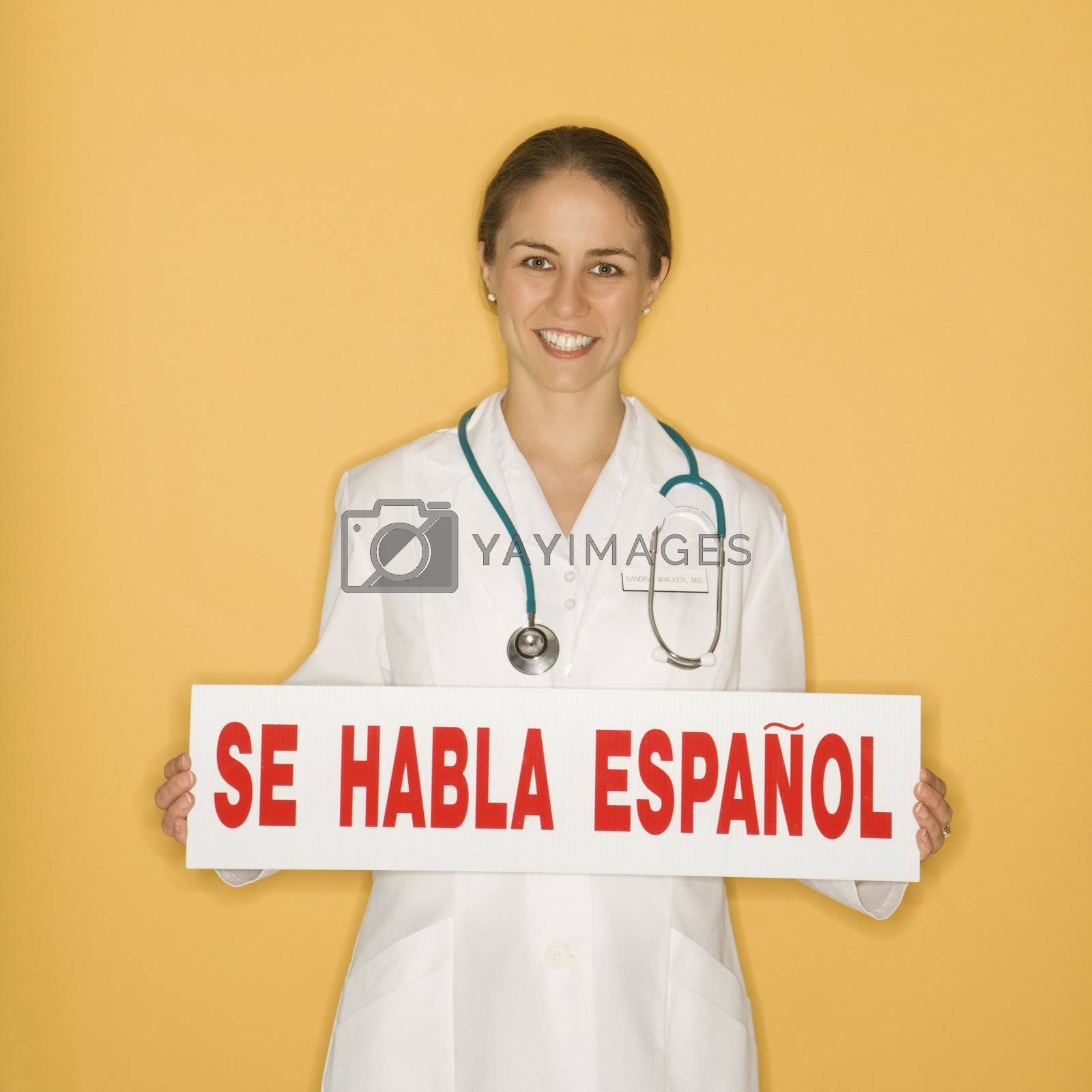 Royalty free image of Doctor and Spanish sign. by iofoto