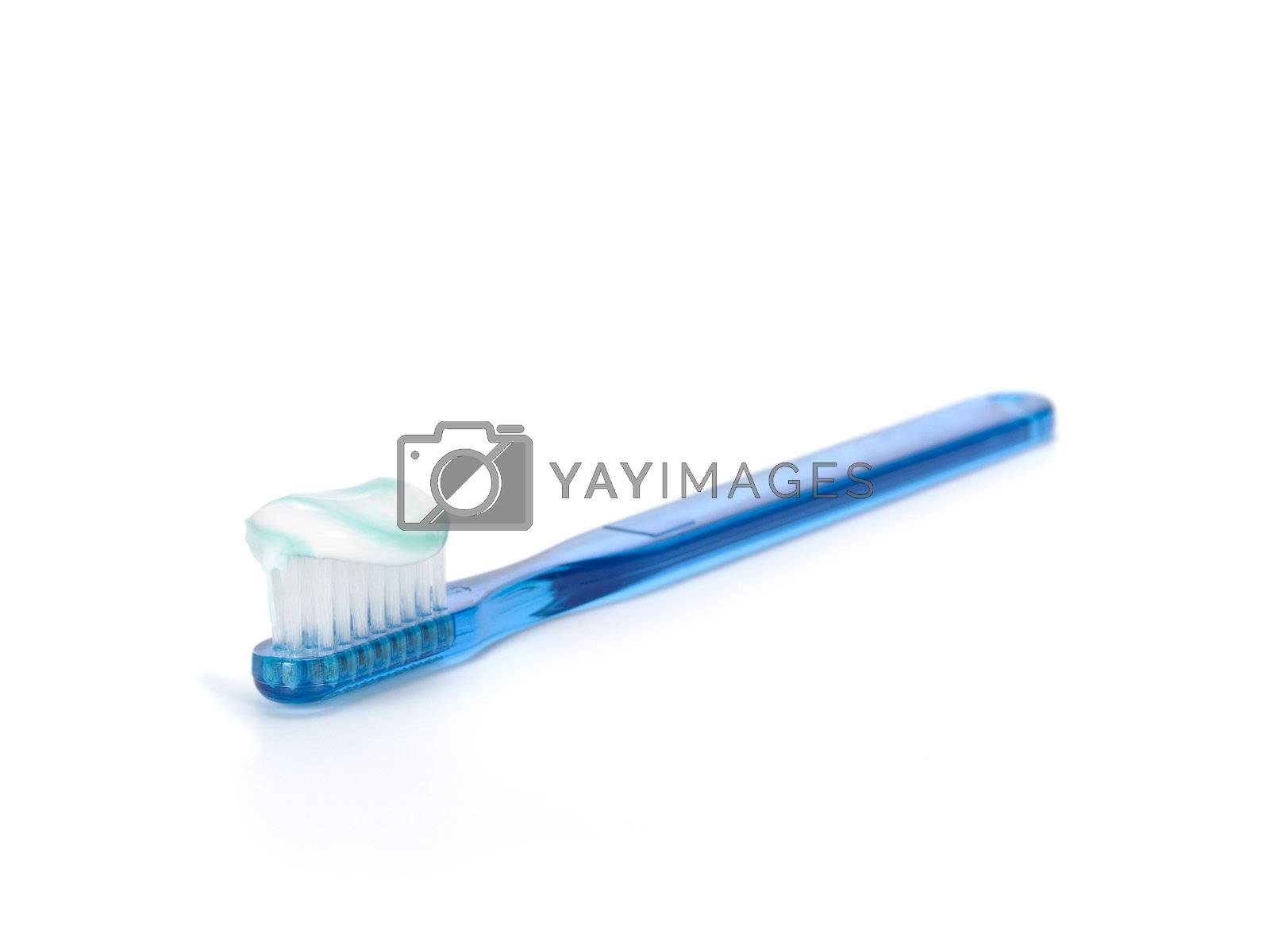 Royalty free image of Toothbrush full of toothpaste by antonprado