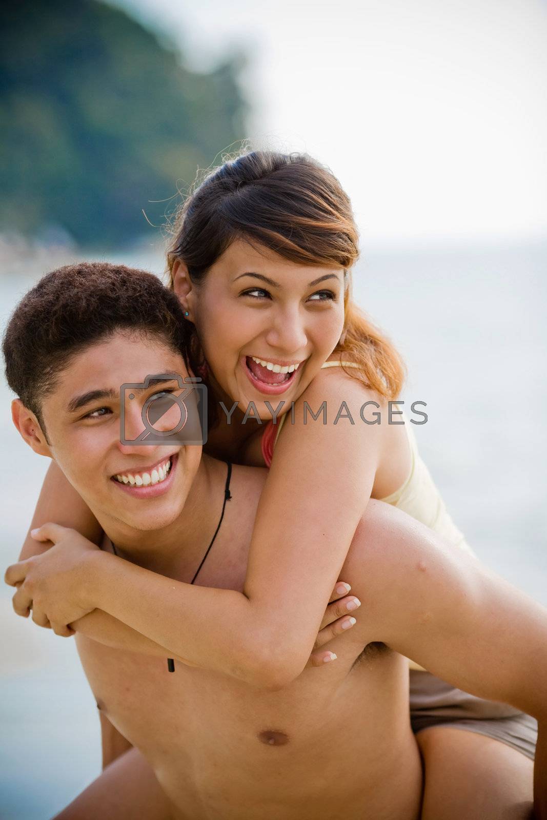 Royalty free image of couple carrying piggyback by eyedear