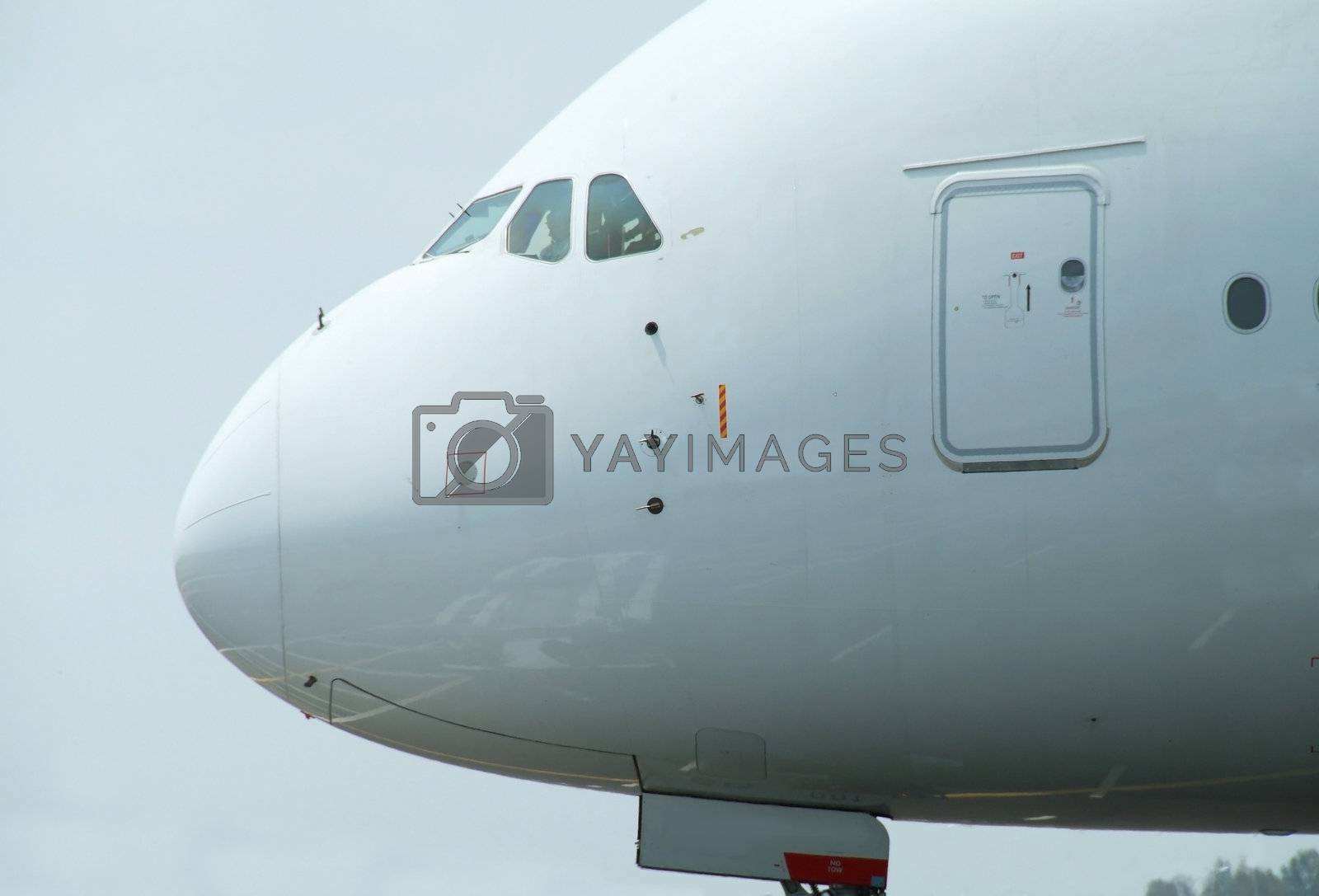 Royalty free image of Nose of big airliner by epixx