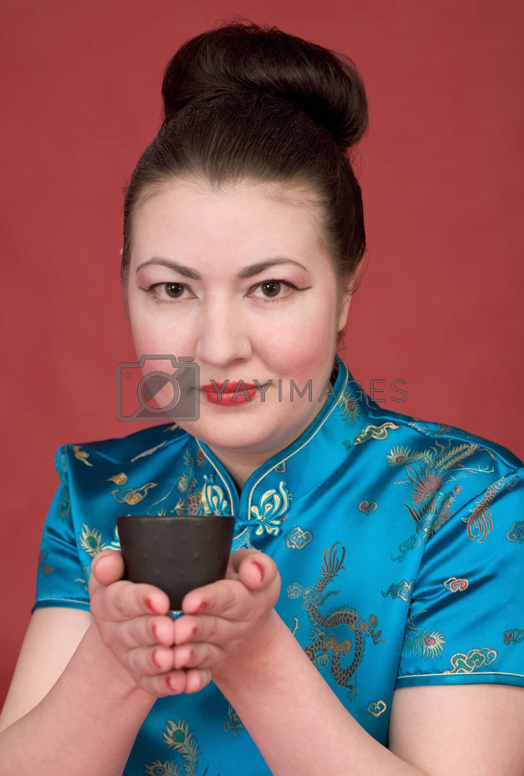 Royalty free image of Japanese girl with teacup by pzaxe