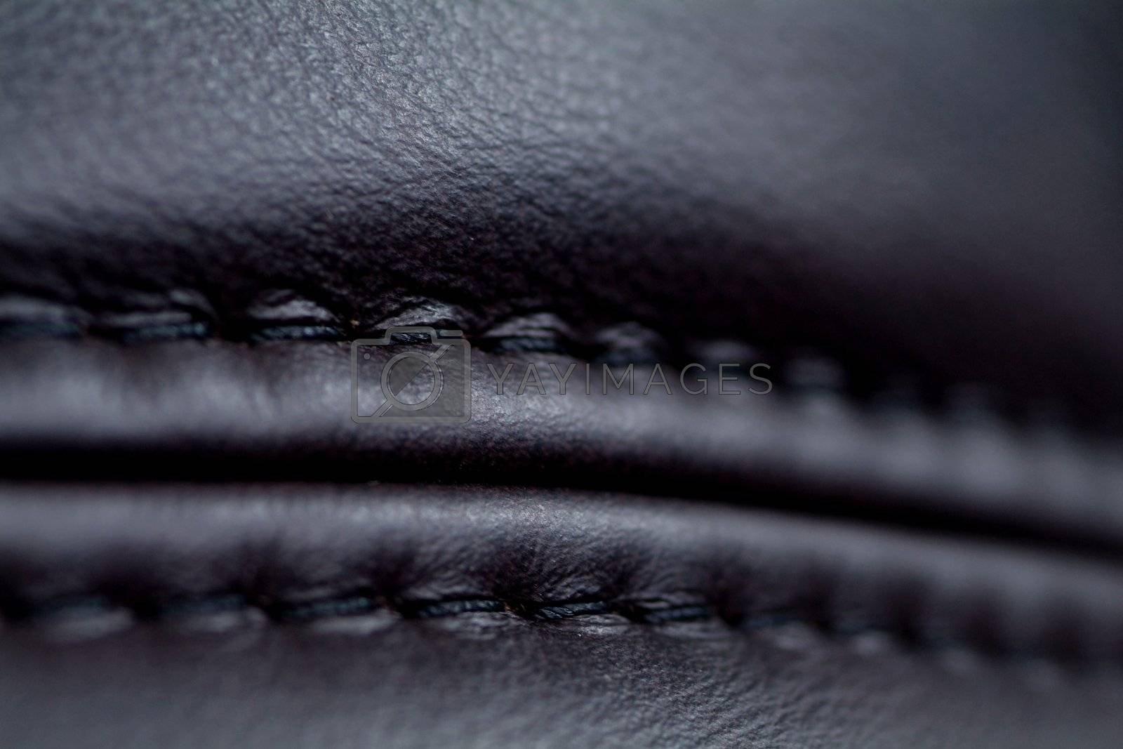 Royalty free image of Seam on black leather by epixx