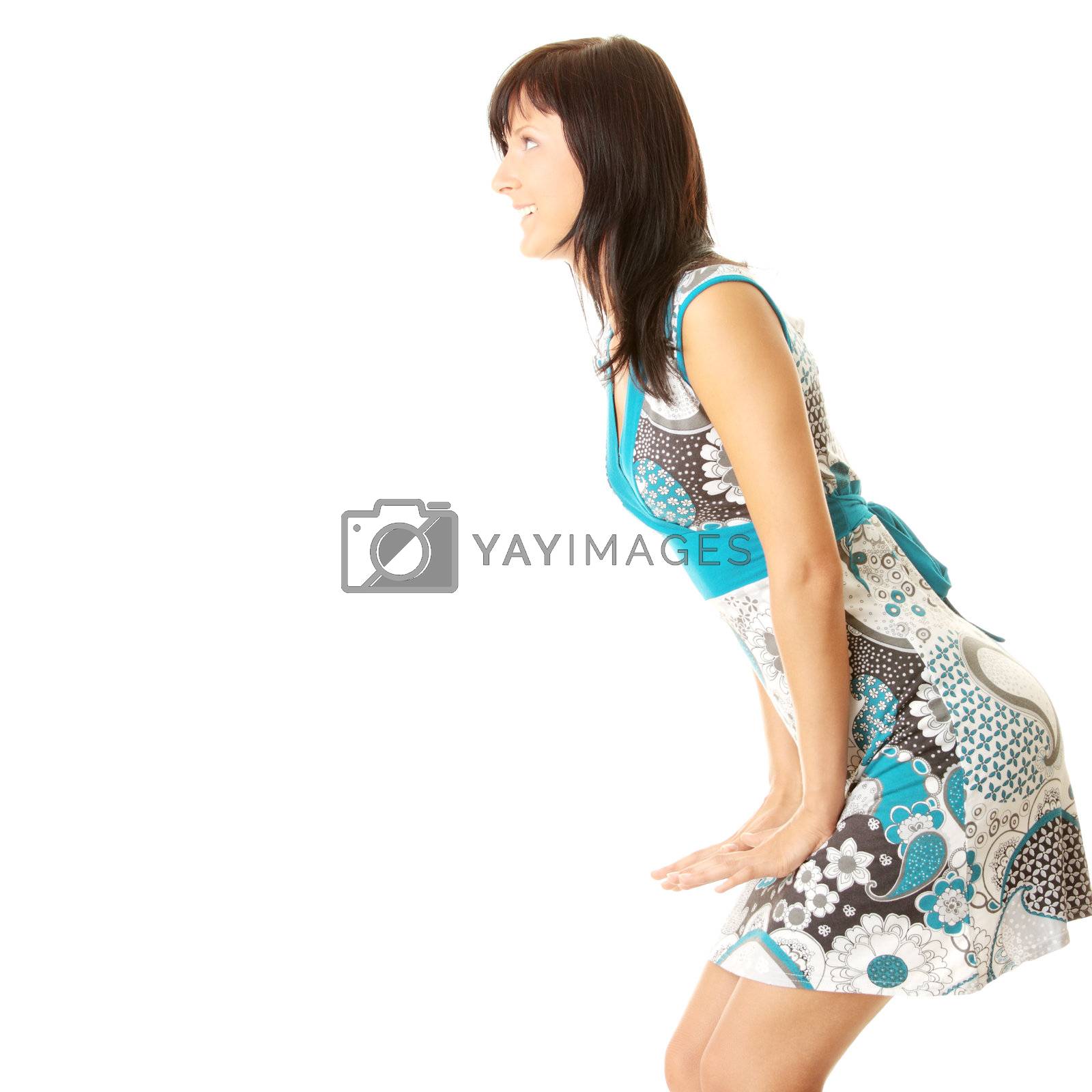 Royalty free image of Young adult girl rejoicing in new dress by BDS