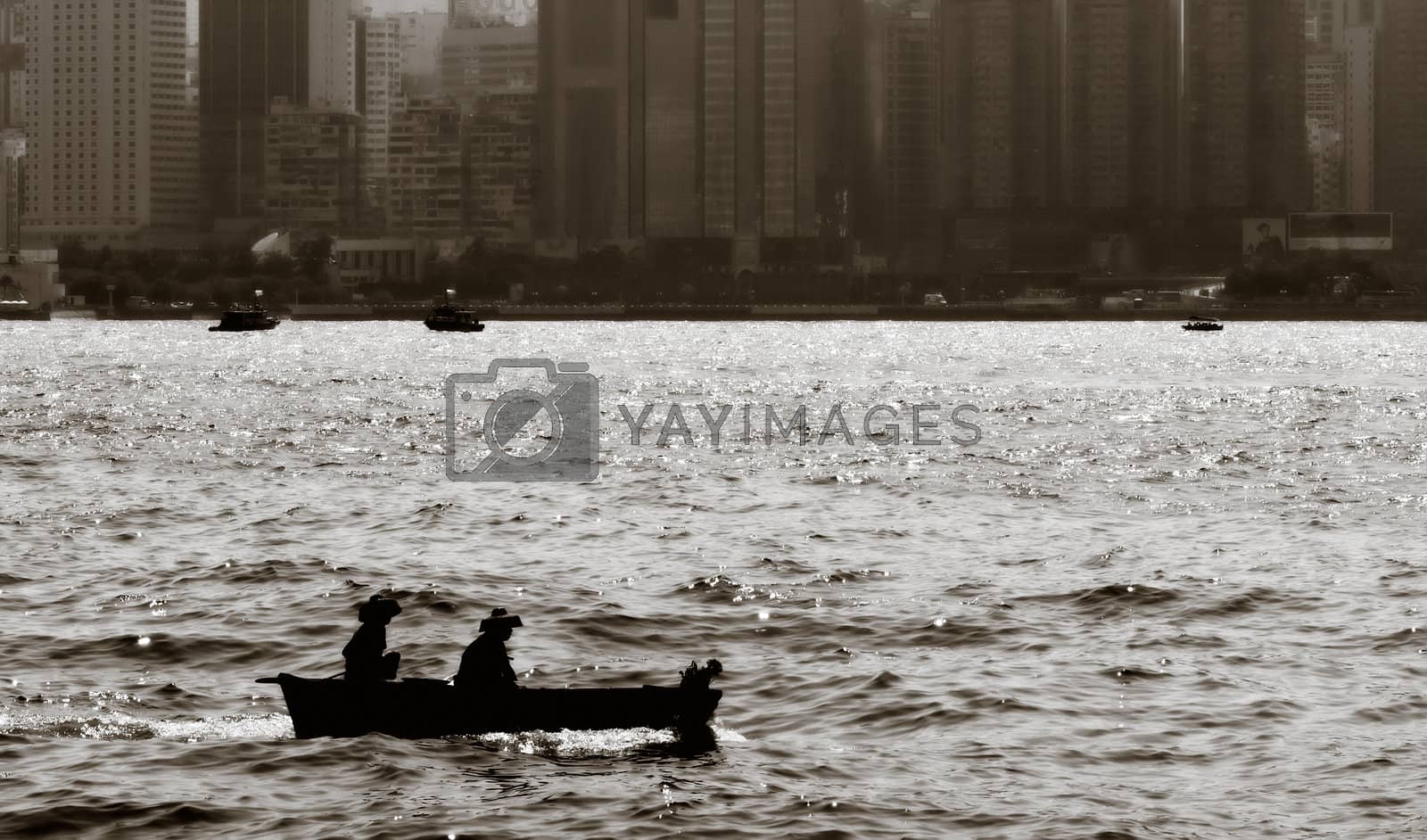 Royalty free image of fishing boat on the ocean by elwynn