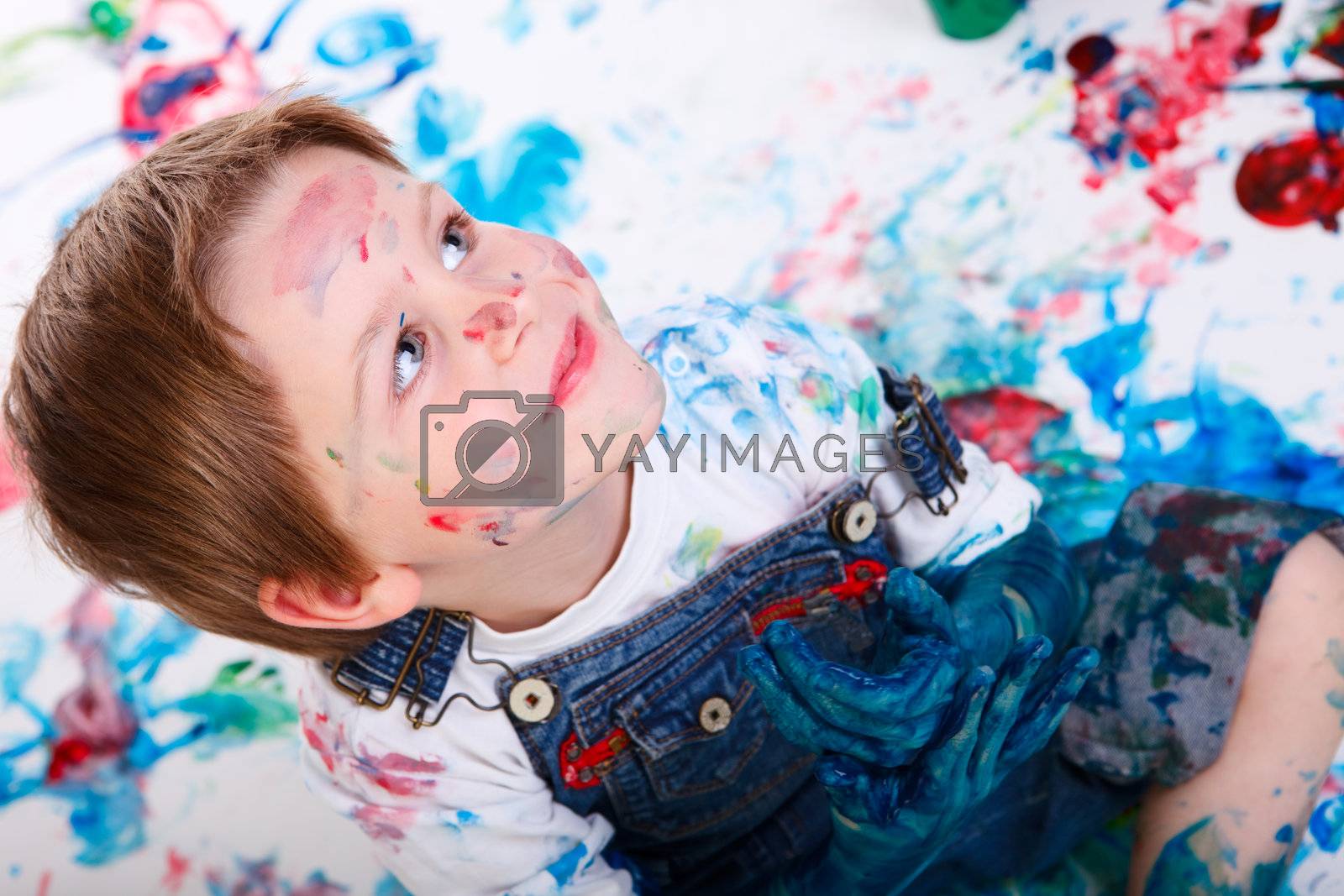 Royalty free image of Boy painting by shalamov