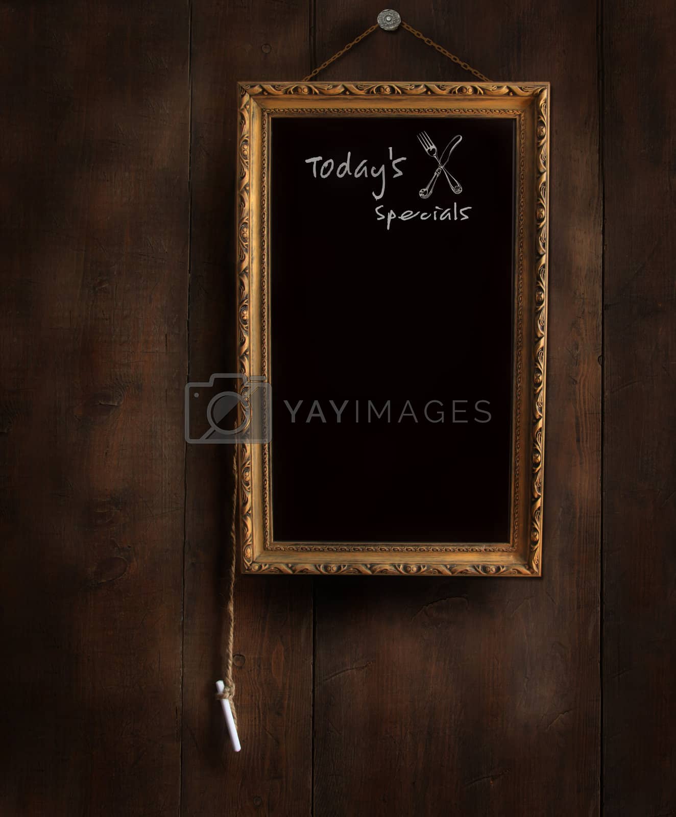 Royalty free image of Old chalkboard with copyspace for writing menu  by Sandralise