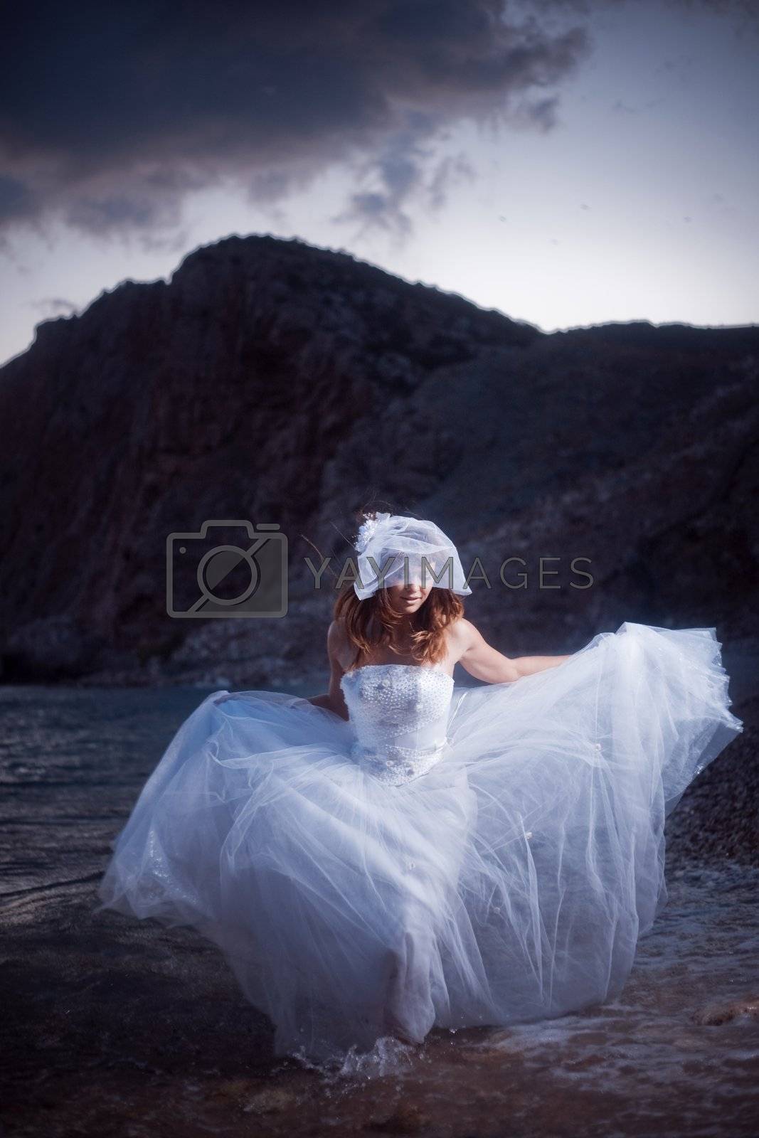 Royalty free image of Running bride by alenkasm