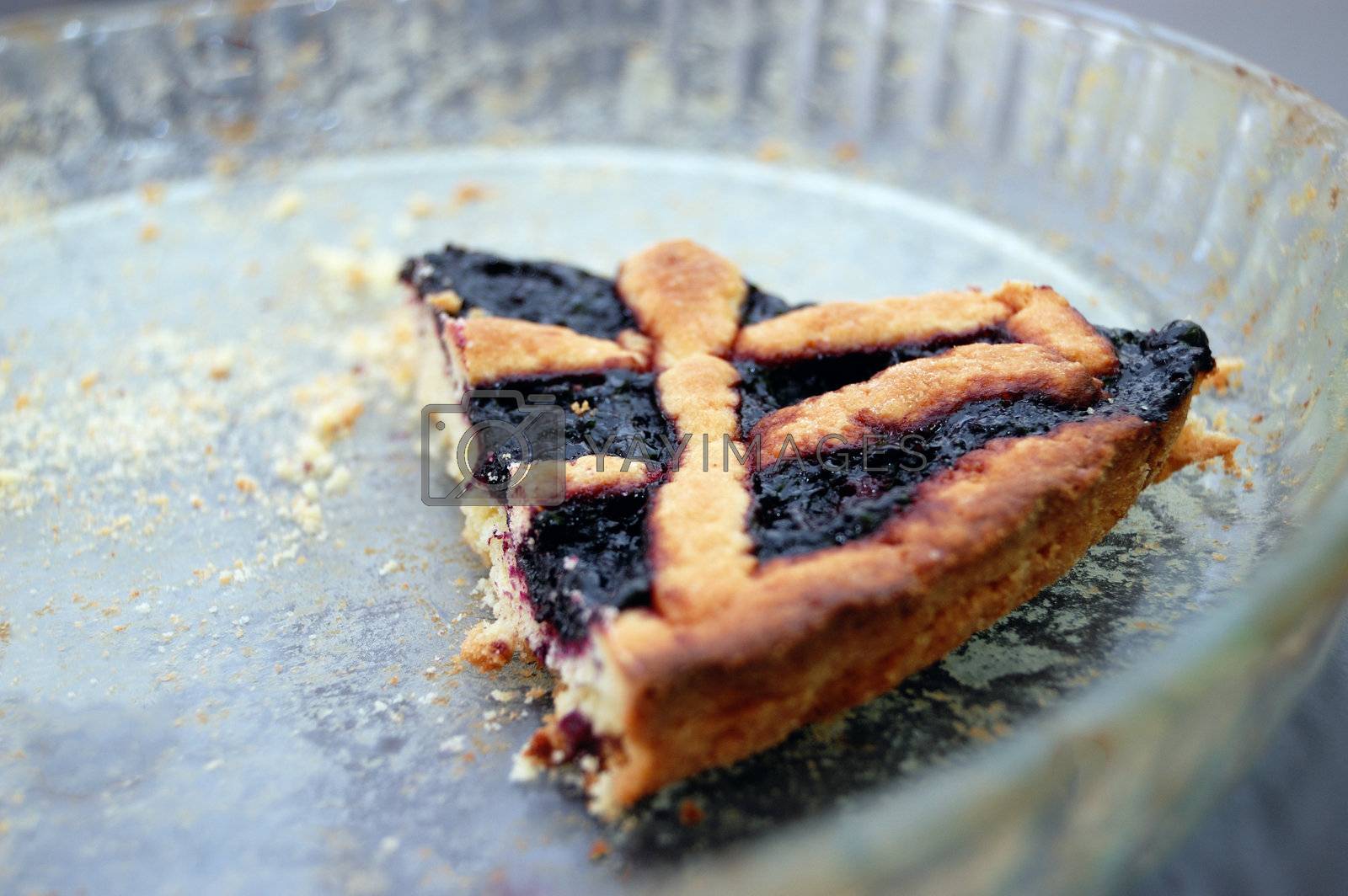 Royalty free image of last piece of Blueberries jam tart by aletermi