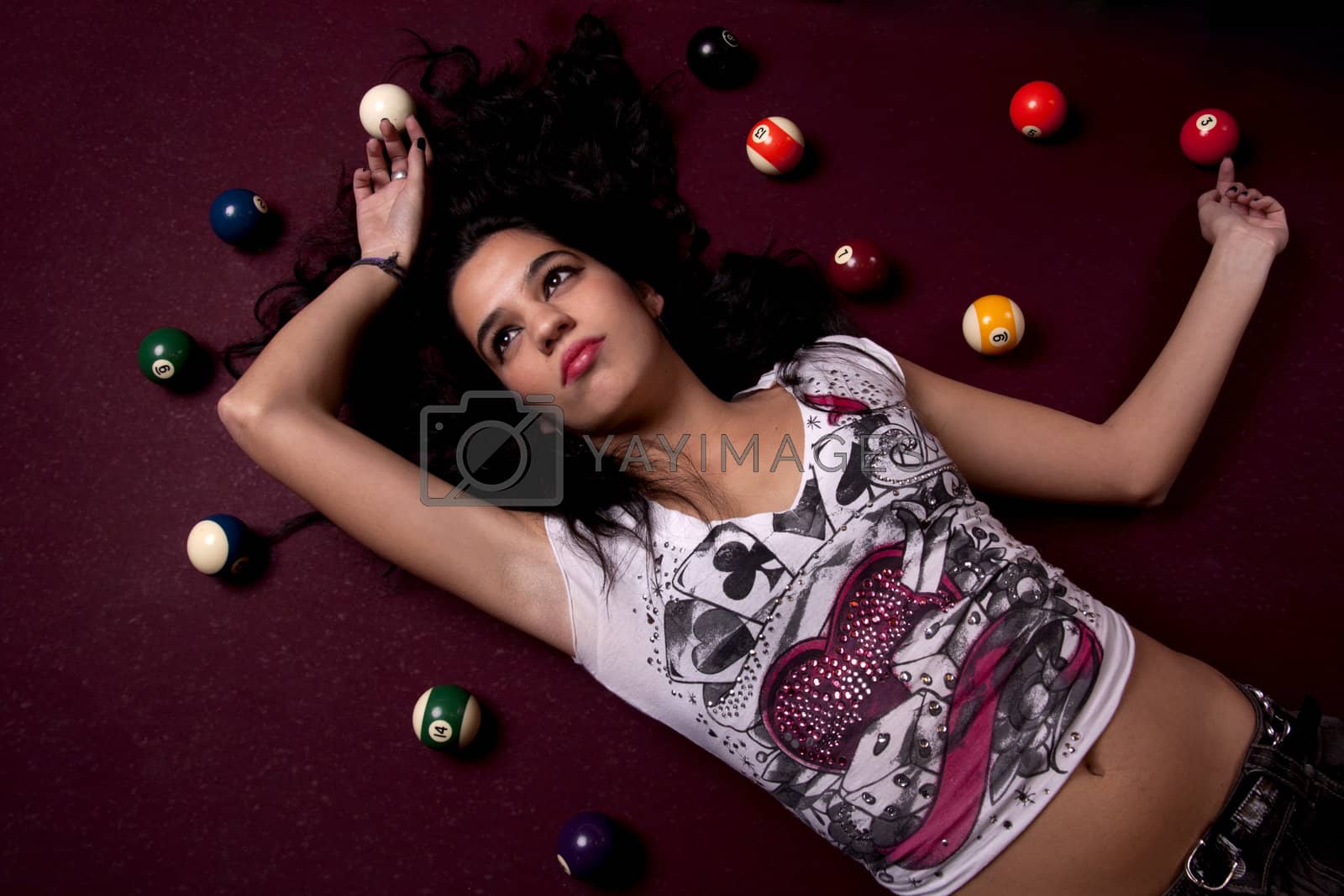 Royalty free image of girl on a snooker table by membio