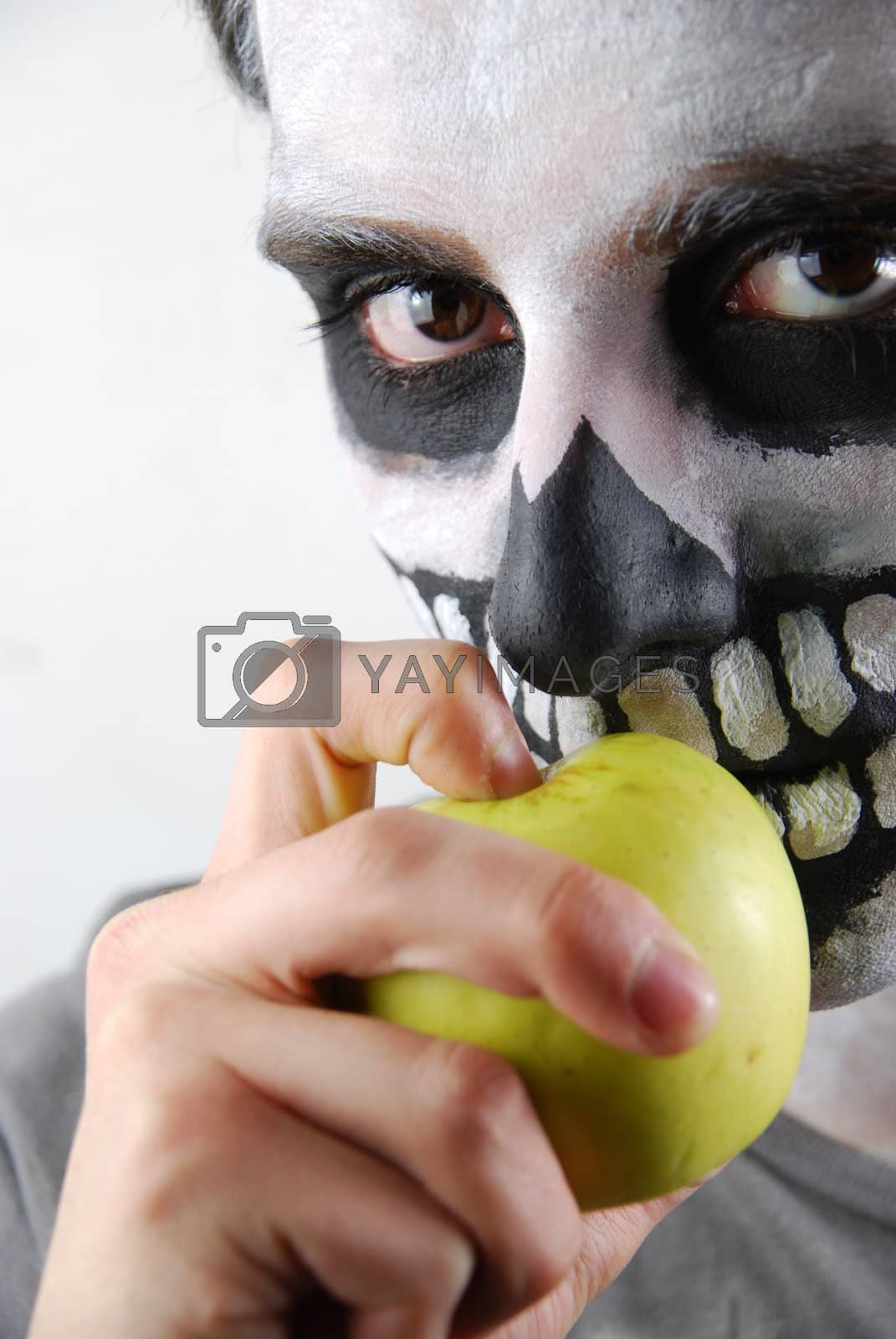 Royalty free image of Don't eat just apples (skeleton guy concept) by luissantos84