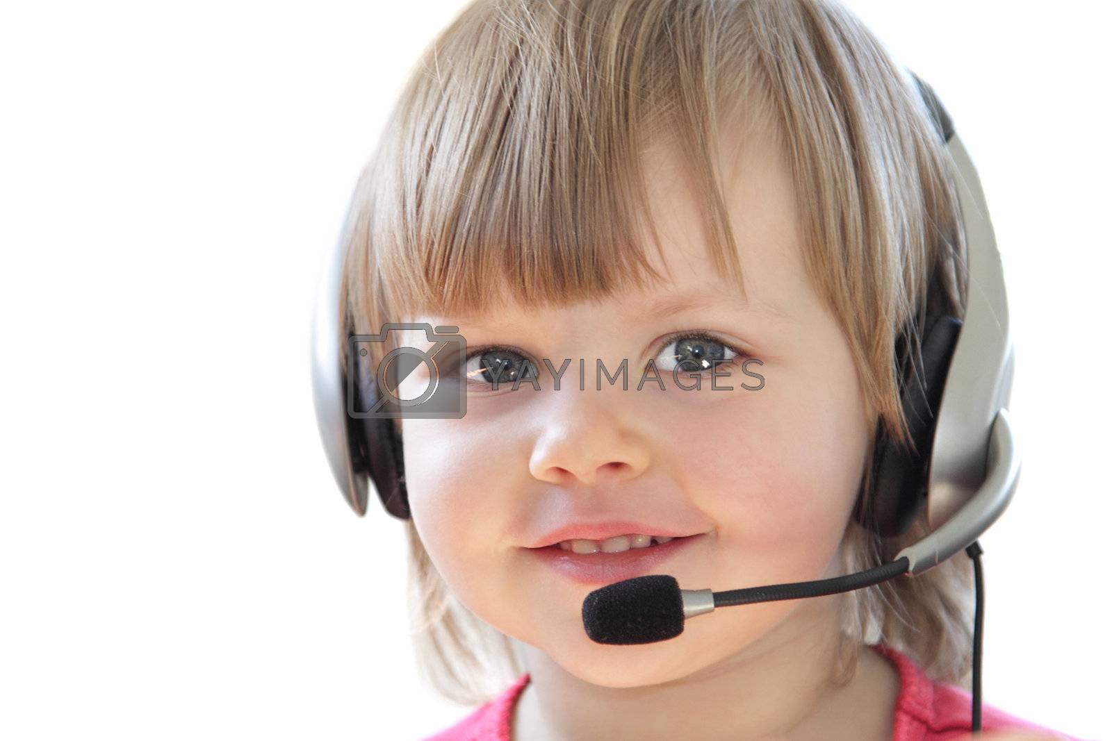 Royalty free image of Little girl with headset by pulen