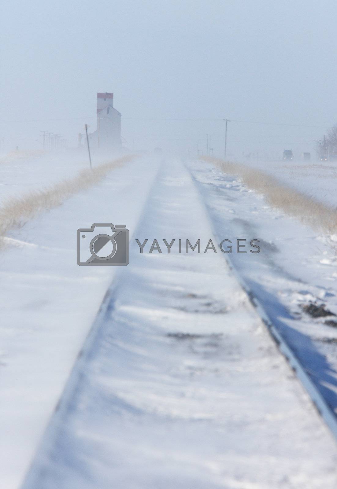 Royalty free image of Train Tracks and Grain Elevator in Blizzard Saskatchewan  by pictureguy