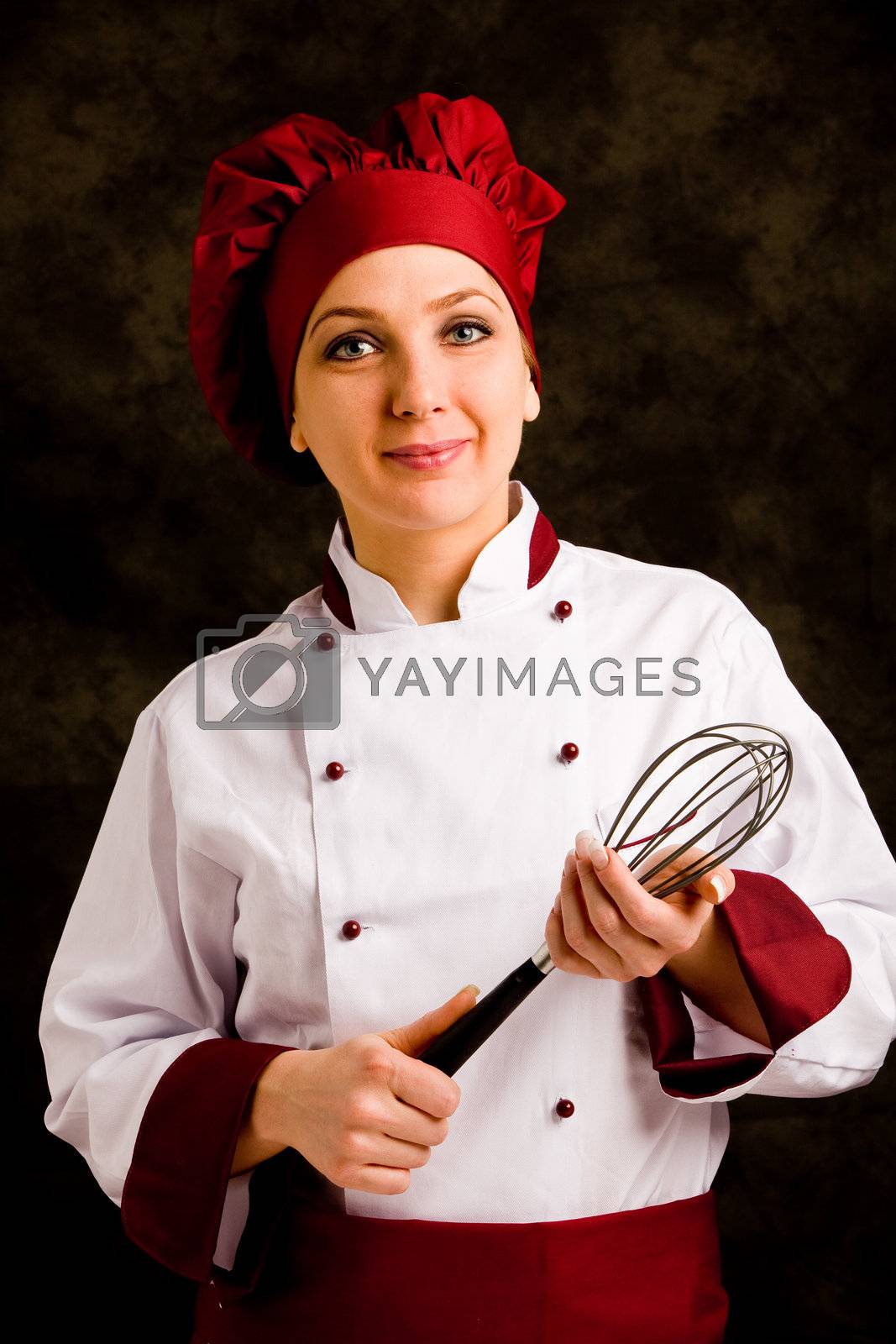 Royalty free image of Chef with whip by genious2000de