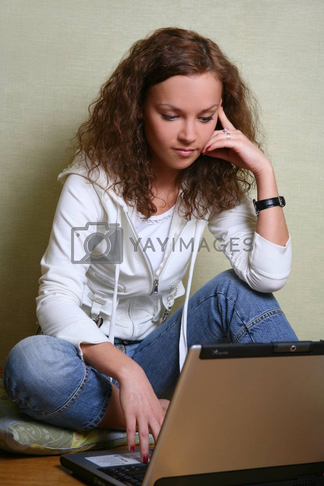 Royalty free image of Girl with a computer by friday