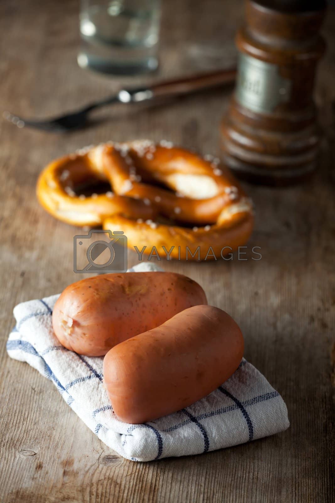 Royalty free image of two bavarian sausages by bernjuer