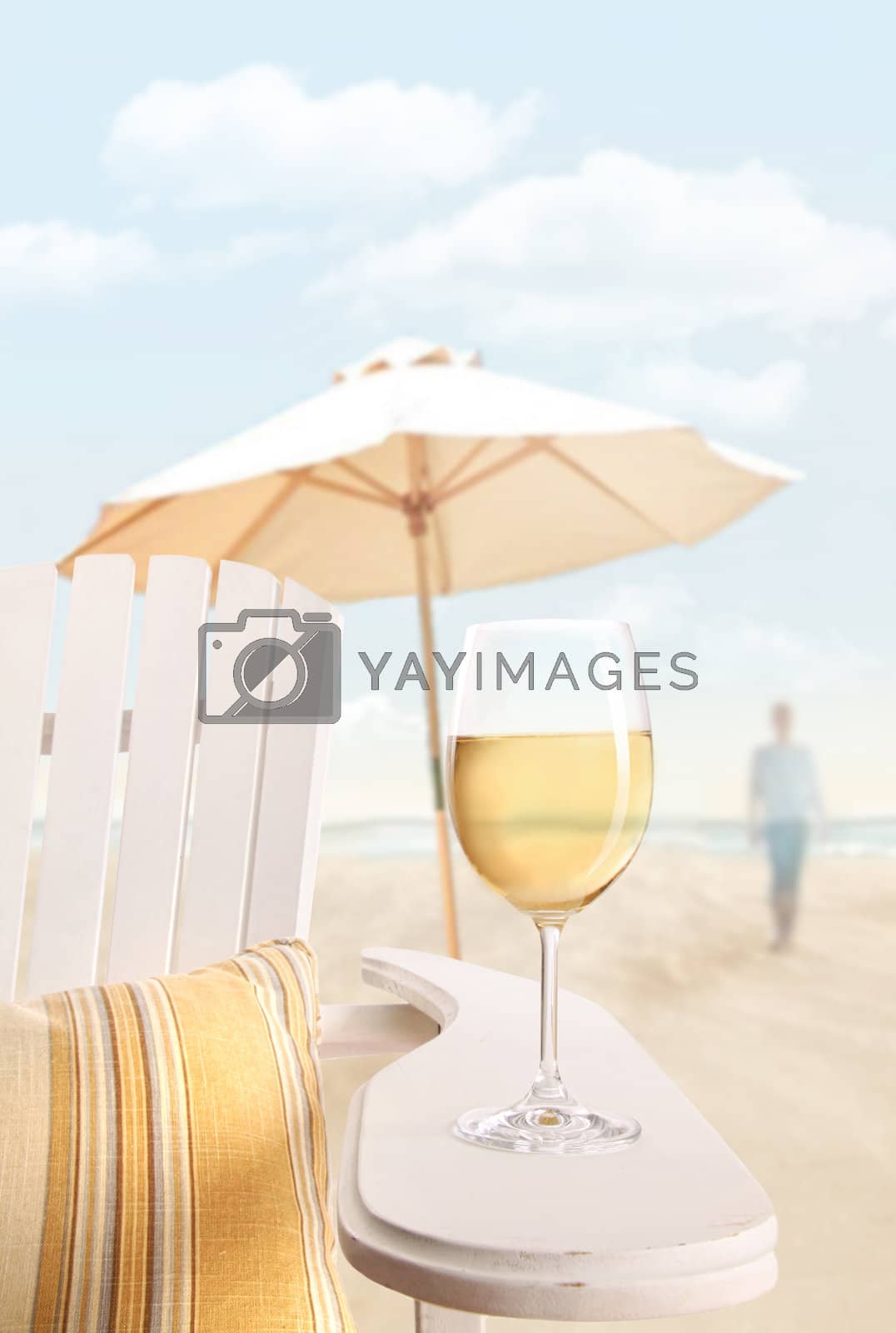 Royalty free image of Glass of  wine on adirondack chair at the beach by Sandralise