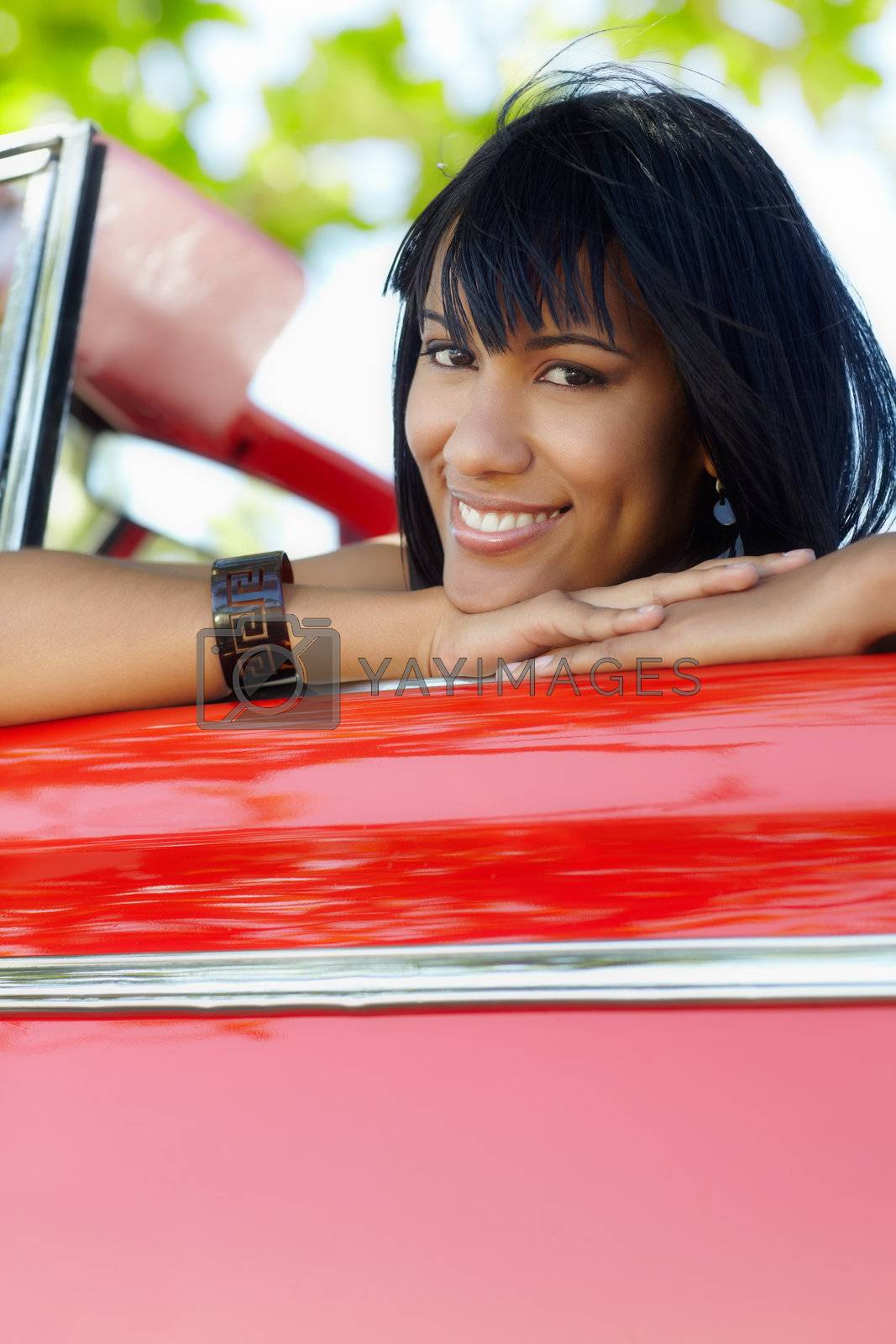 Royalty free image of beautiful woman in cabriolet car by diego_cervo