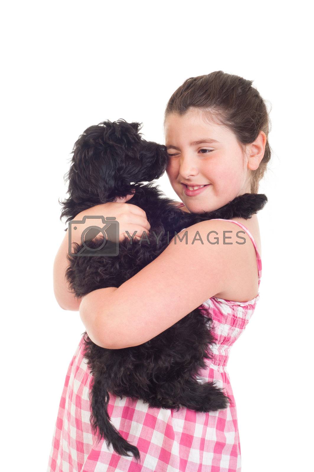 Royalty free image of Dog kissing girl by luissantos84