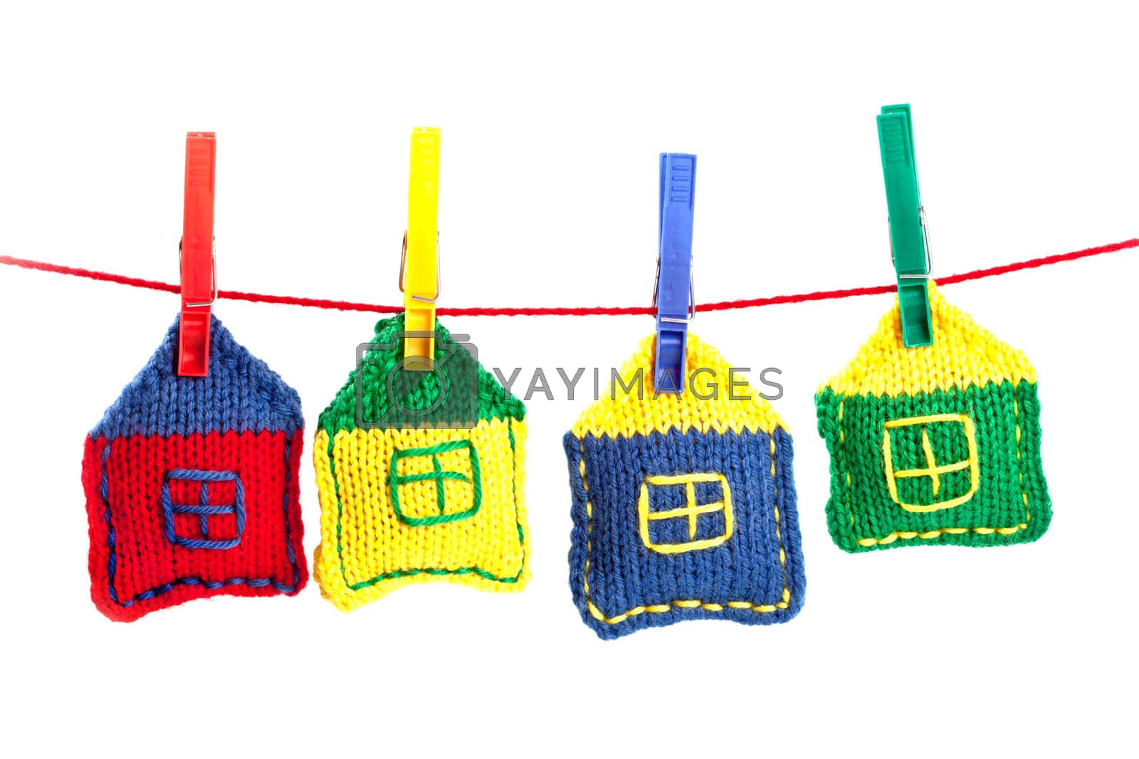 Royalty free image of four knitted colorful houses  by marylooo