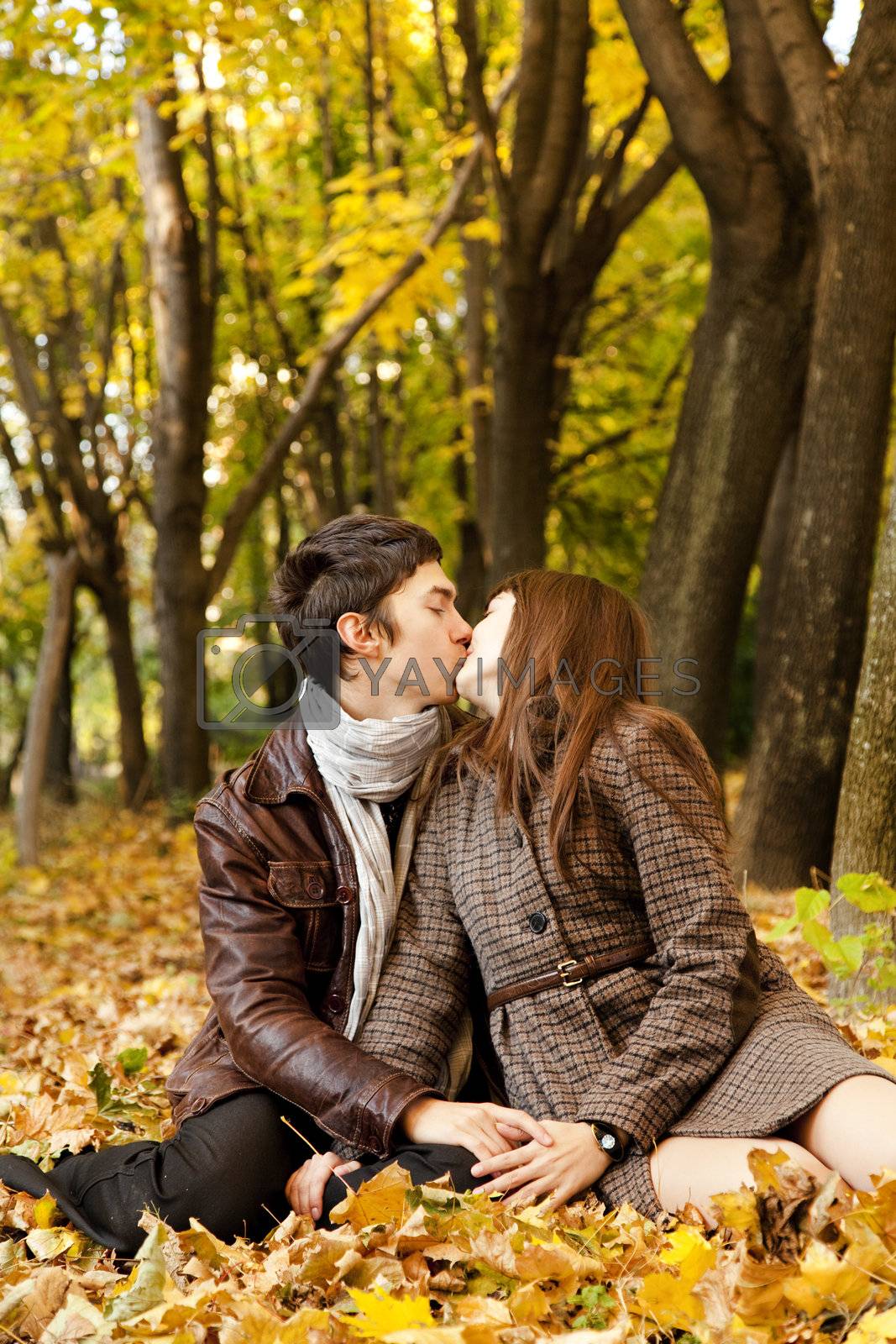 Royalty free image of Couple kissing in the park by masson