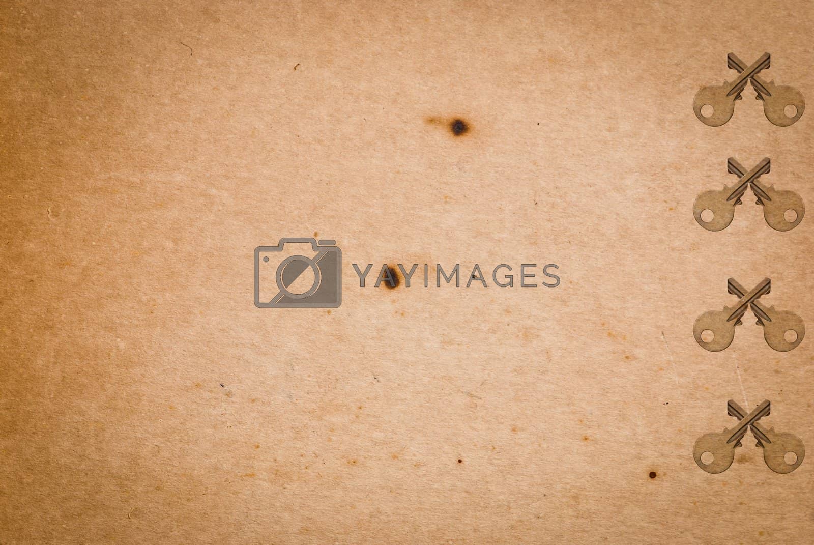 Royalty free image of Rusty keys on old paper background by sasilsolutions