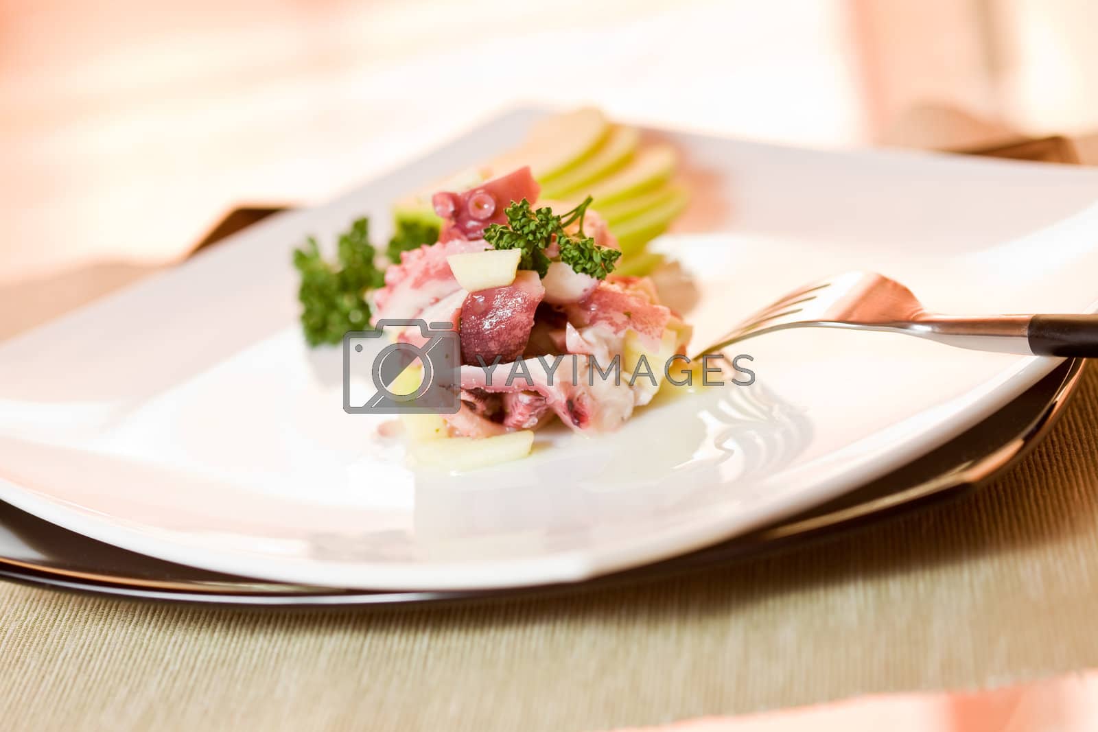 Royalty free image of Octopus Tartare with Green Apple by genious2000de