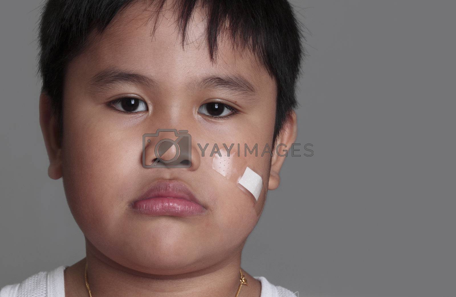Royalty free image of Portrait of a young boy by sacatani