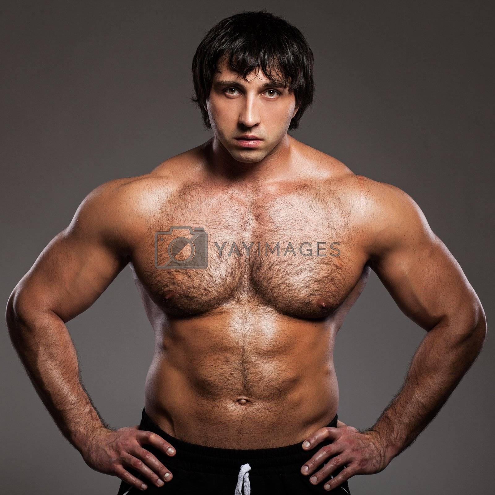Bodybuilder with naked torso Stock photo and royalty 