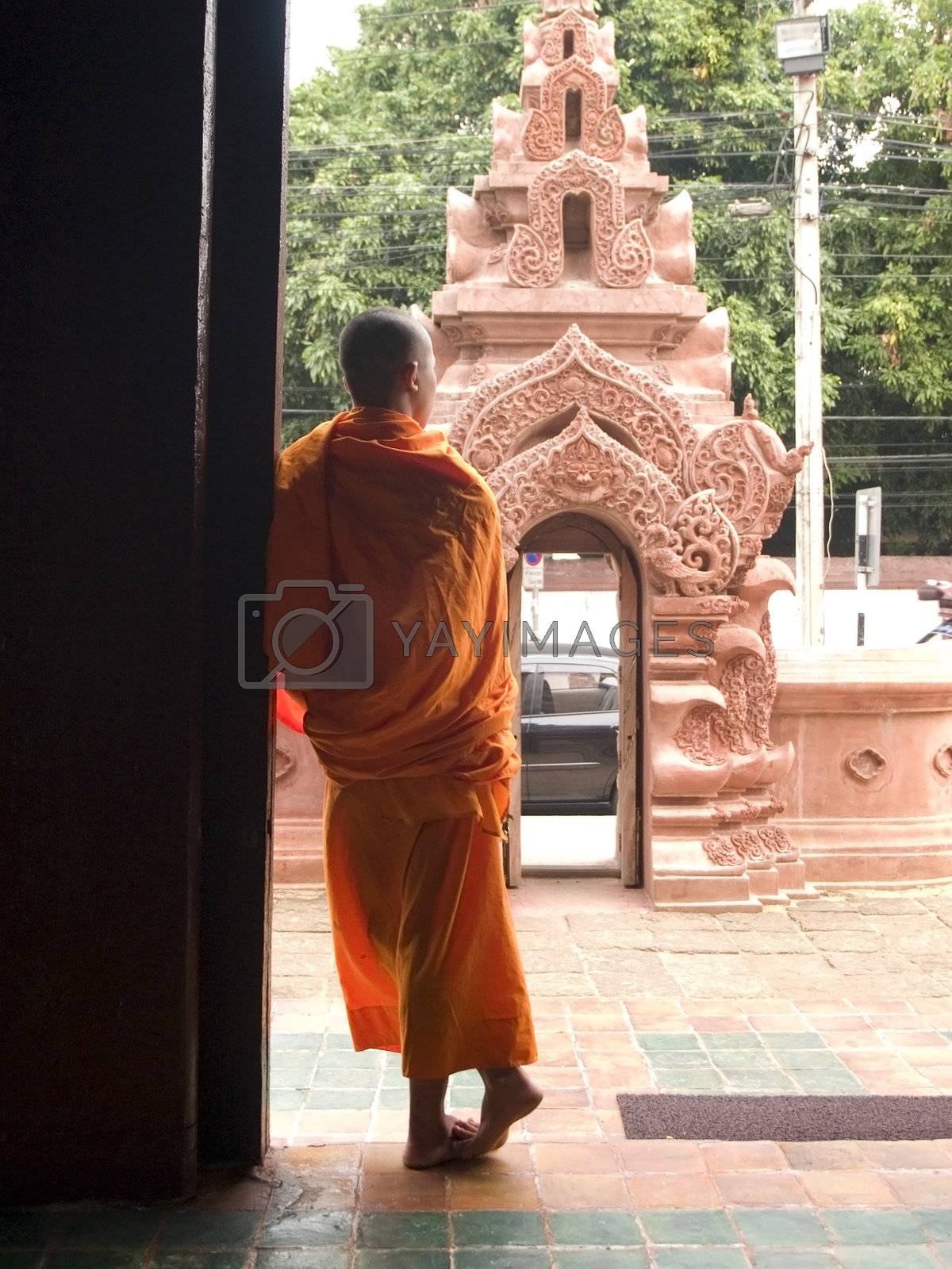 Royalty free image of Buddhist monk resting by epixx