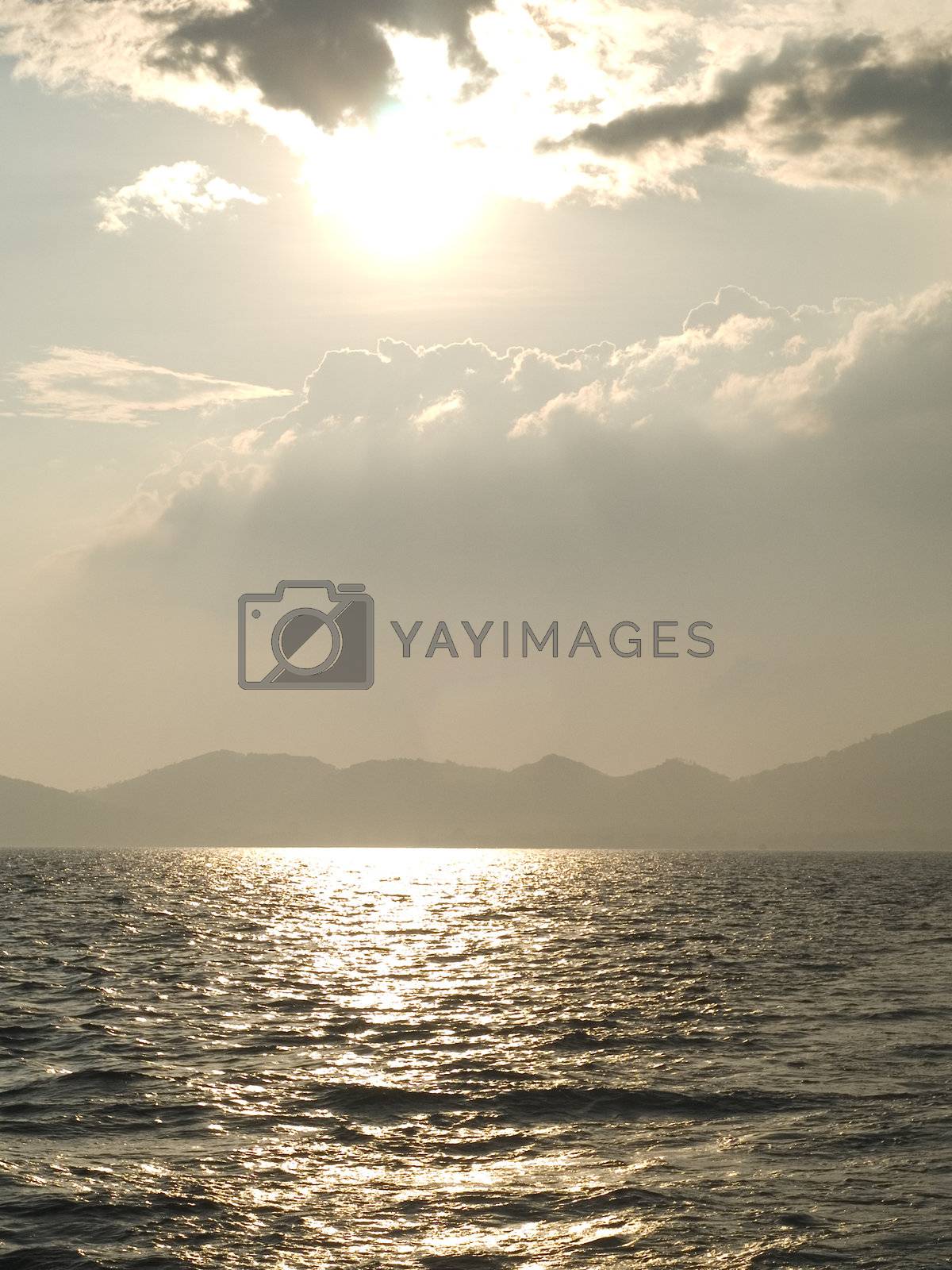 Royalty free image of Sun, sea and clouds by epixx