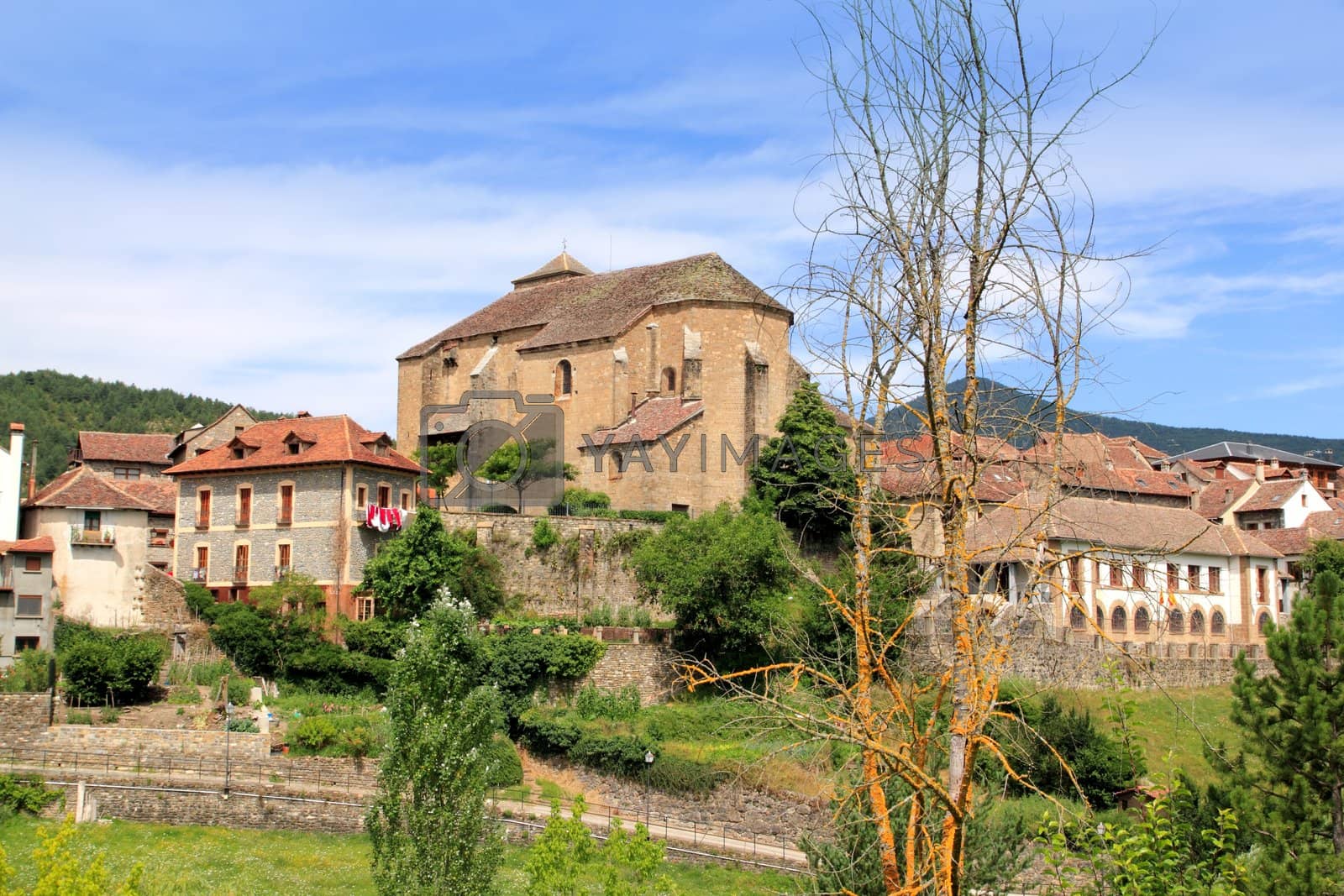 Royalty free image of Hecho village Pyrenees with Romanesque church by lunamarina