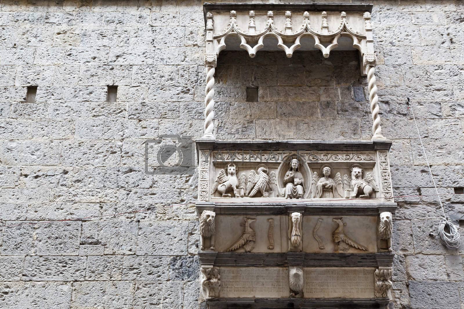 Royalty free image of Building with Marble Balcony and Relief in Genoa, Italy by anshar