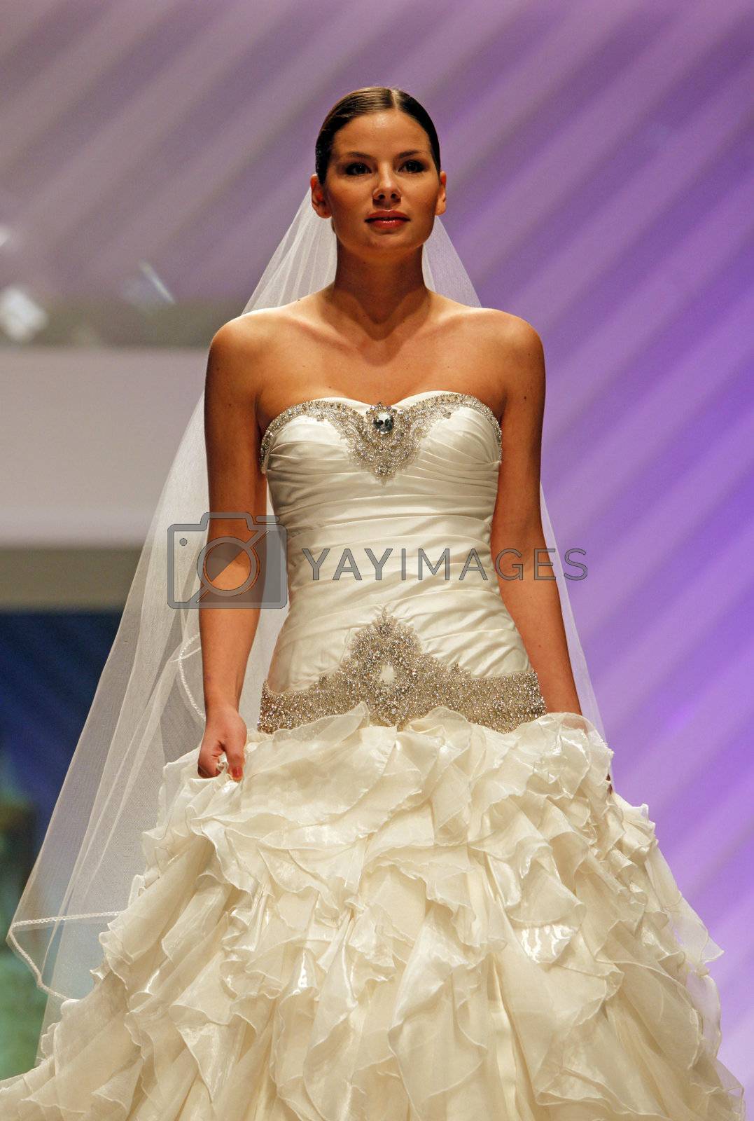 Royalty free image of Wedding dresses fashion show by atlas