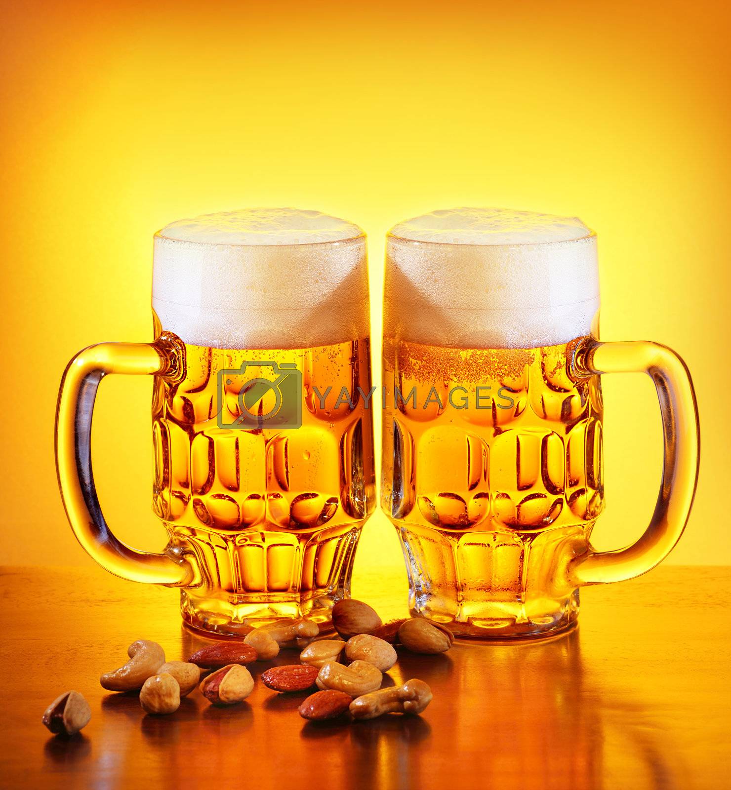 Royalty free image of Beer and nuts by Anna_Omelchenko