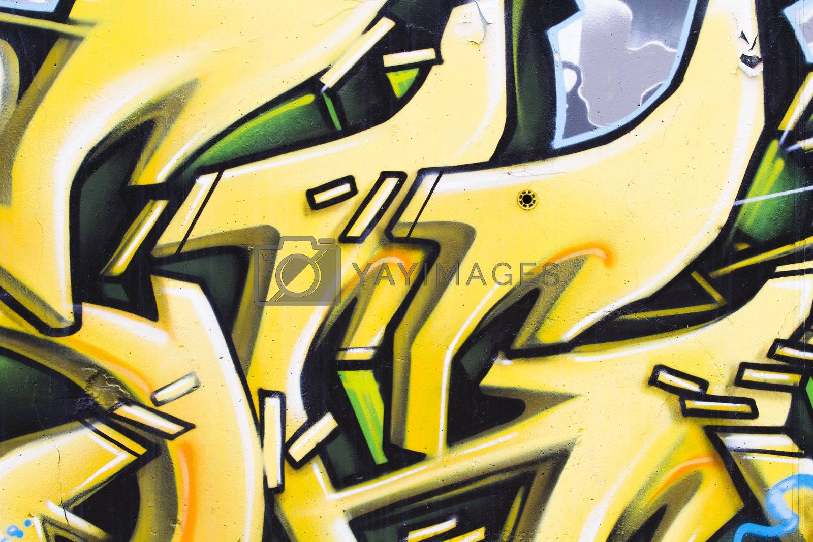 Royalty free image of Colorful grafitti arrows with yellow letters by FernandoCortes