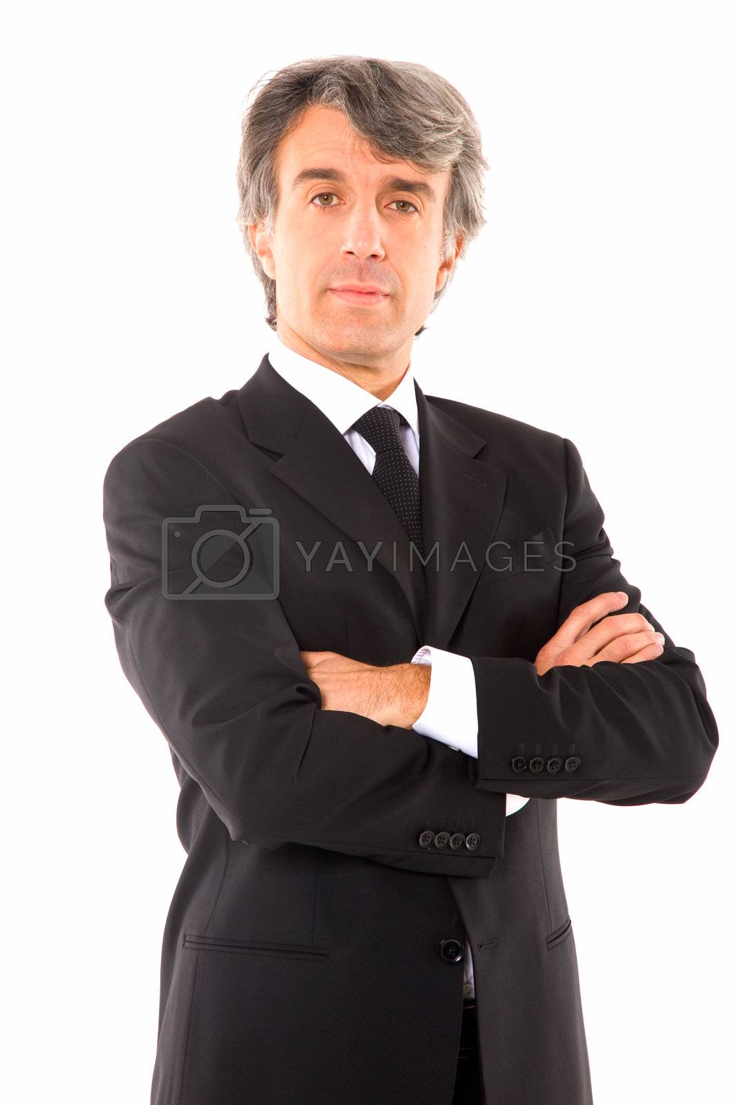 Royalty free image of businessman with arms crossed by ambro