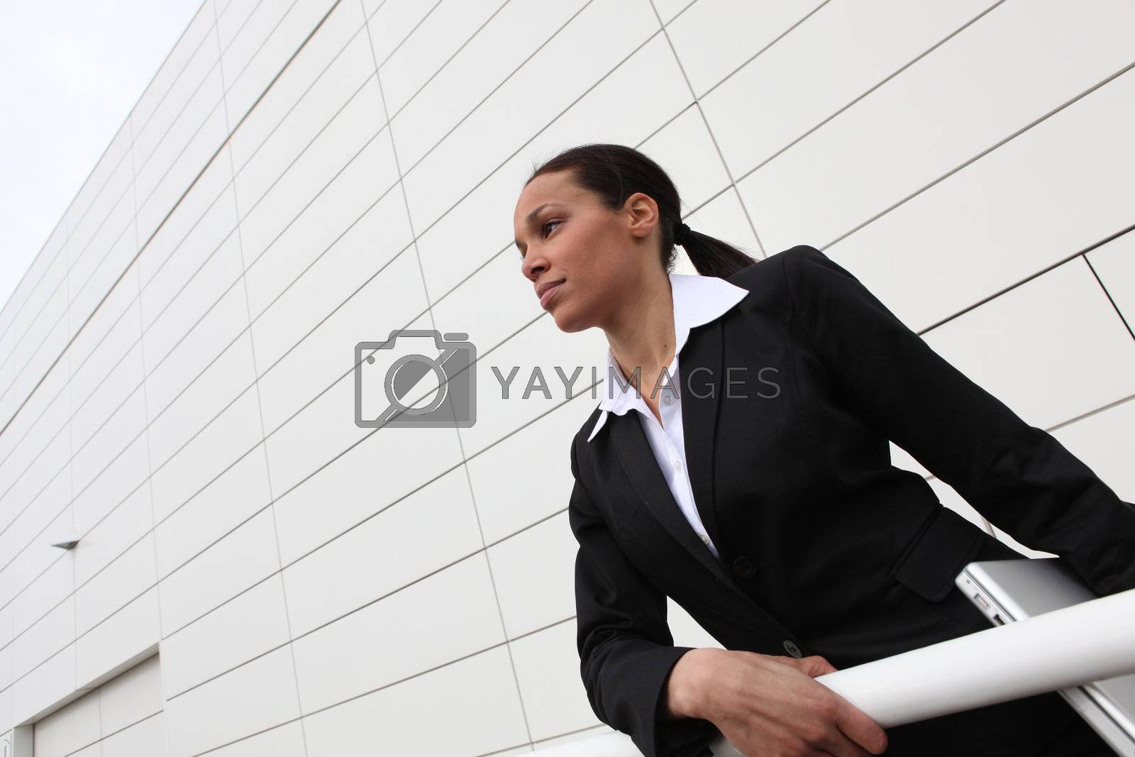 Royalty free image of Ambitious businesswoman by phovoir