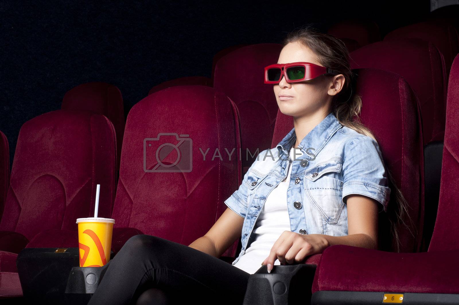 Royalty free image of woman at the cinema by adam121
