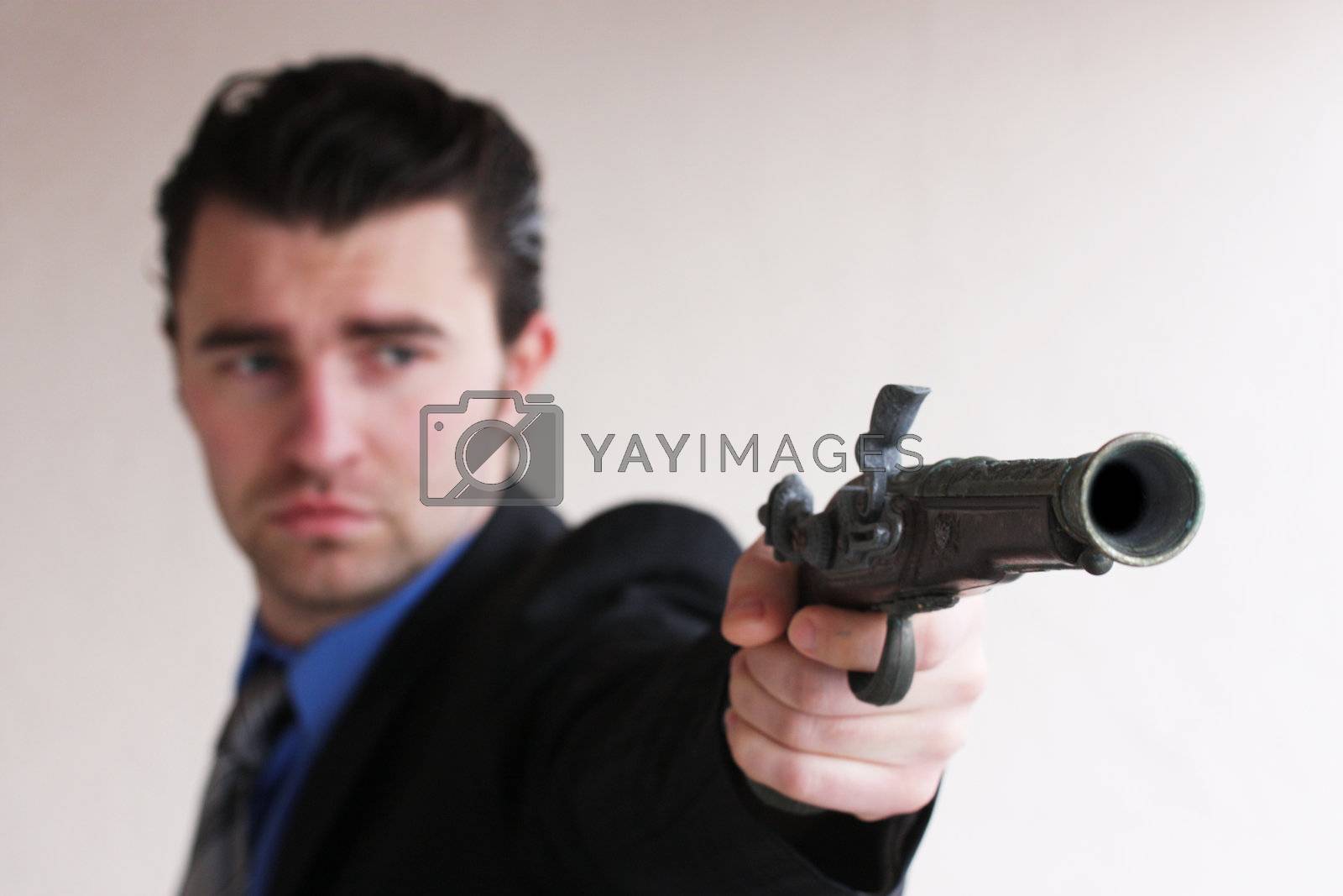 Royalty free image of businessman wants to shoot by photochecker