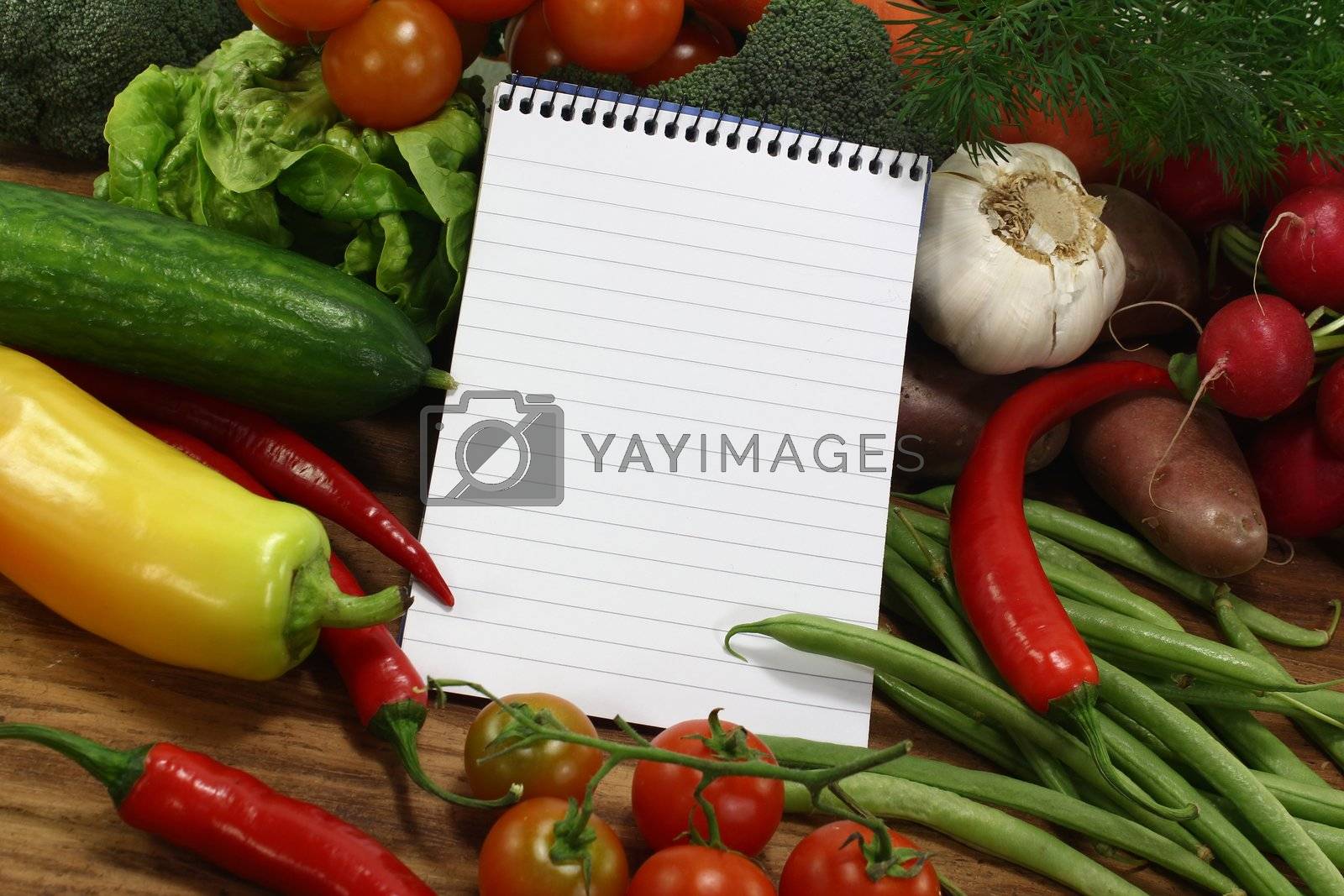 Royalty free image of shopping list with fresh vegetables by discovery