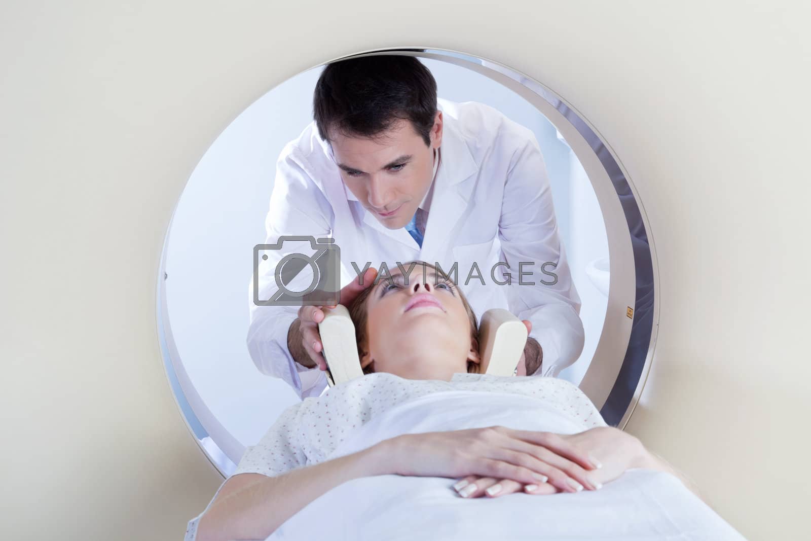 Royalty free image of Patient going through MRI test by leaf