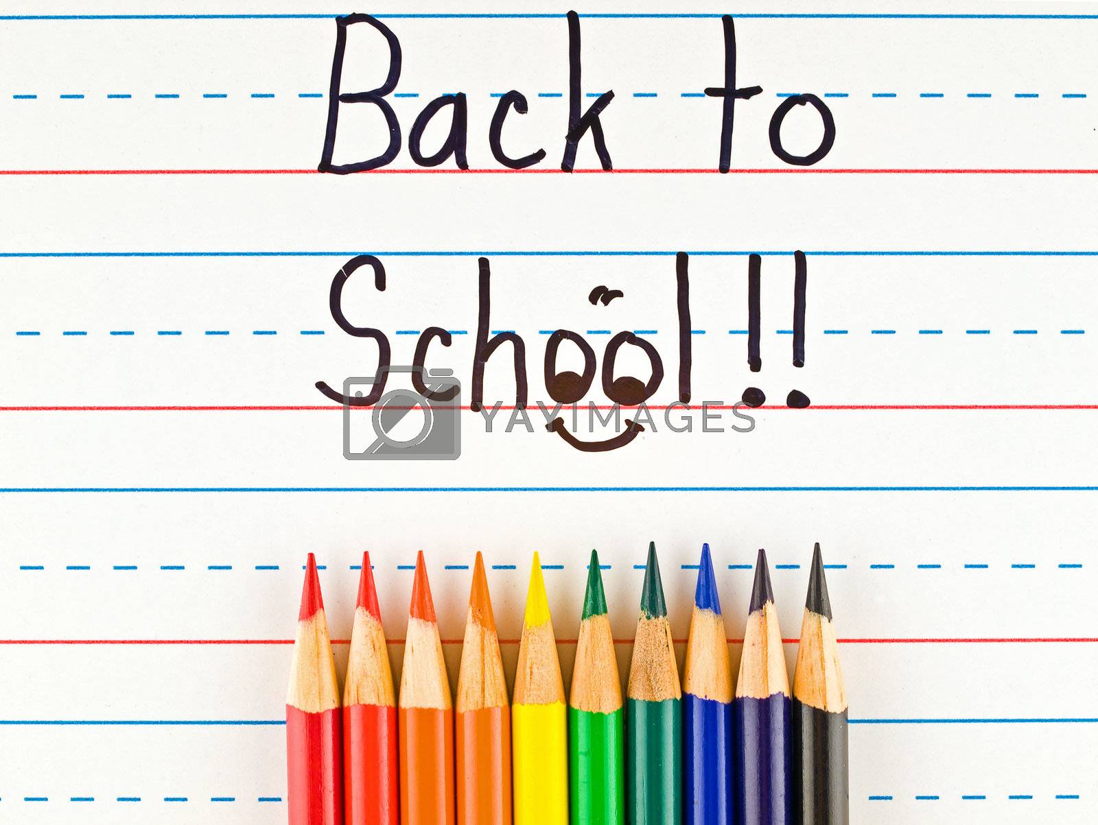 Royalty free image of Back to School Written on a Lined Dry Erase Board with Colored Pencils by Frankljunior