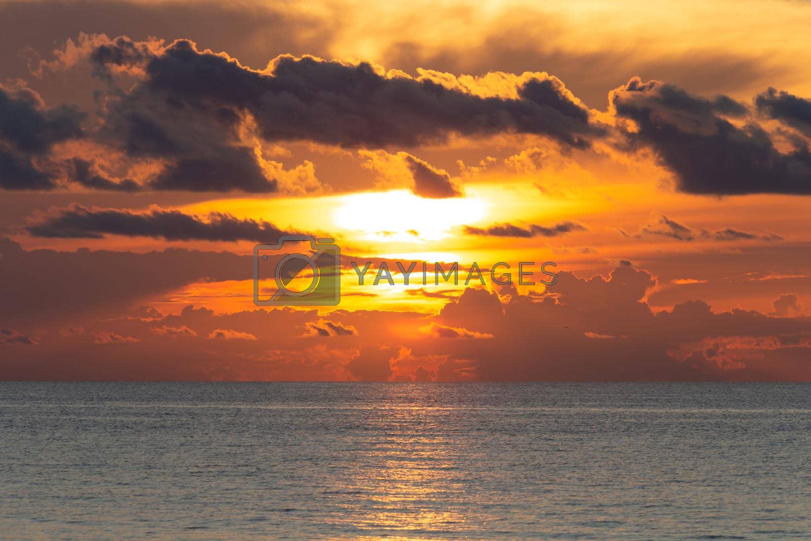 Royalty free image of Beautiful dramatic cloudscape landscape sunset from the beach by Mariakray