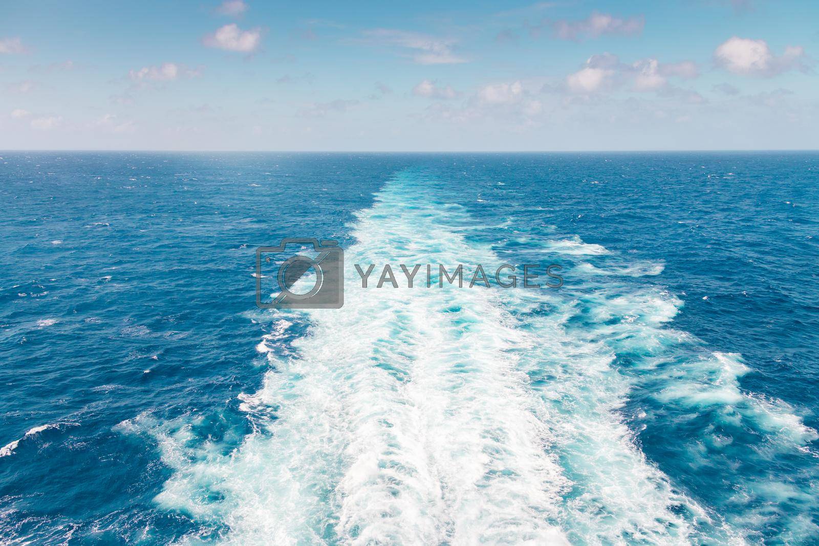 Royalty free image of Cruise ship wake or trail on ocean surface by Mariakray
