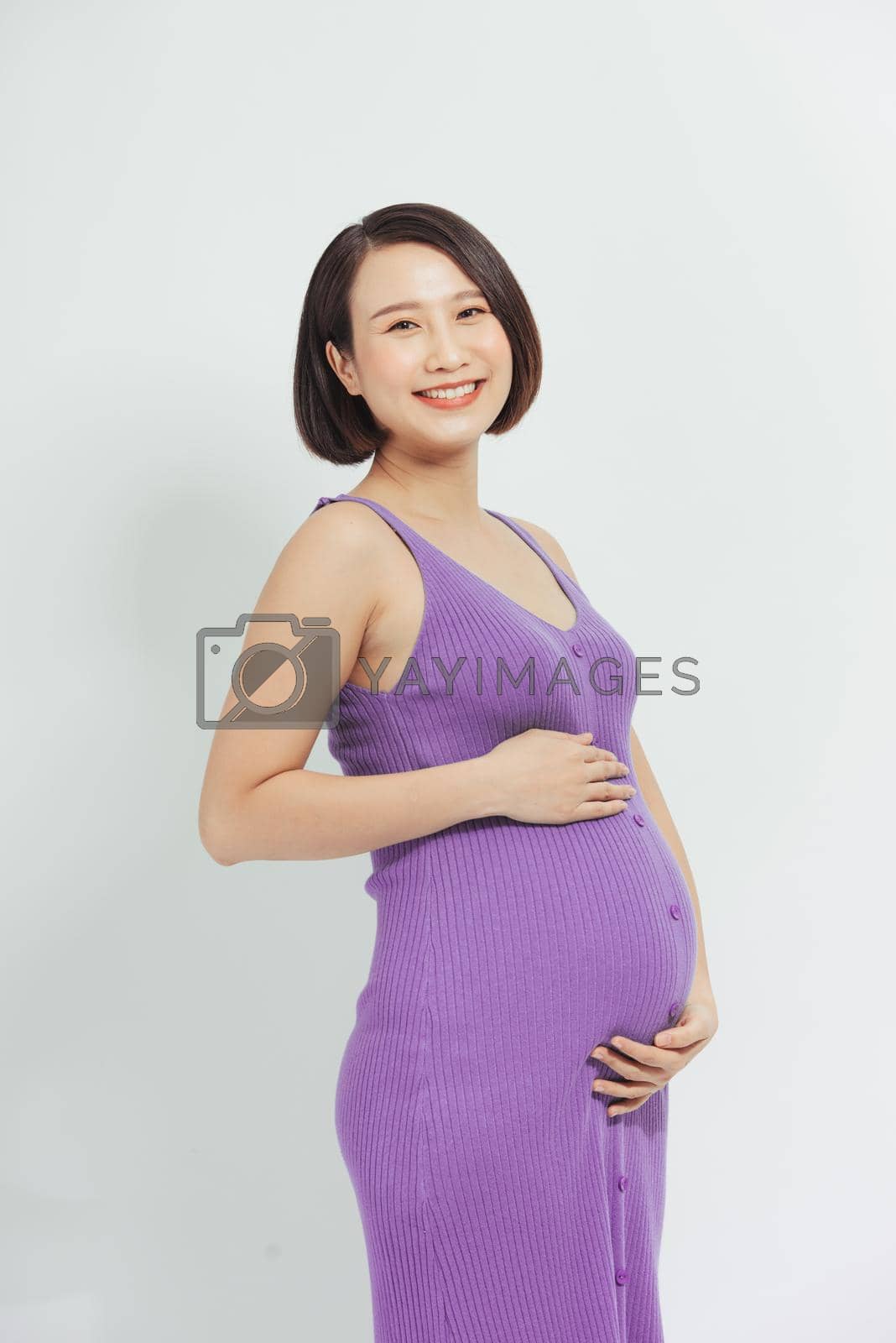 Royalty free image of New life concept. Pregnancy, motherhood and happiness. Tummy of pregnant woman by makidotvn