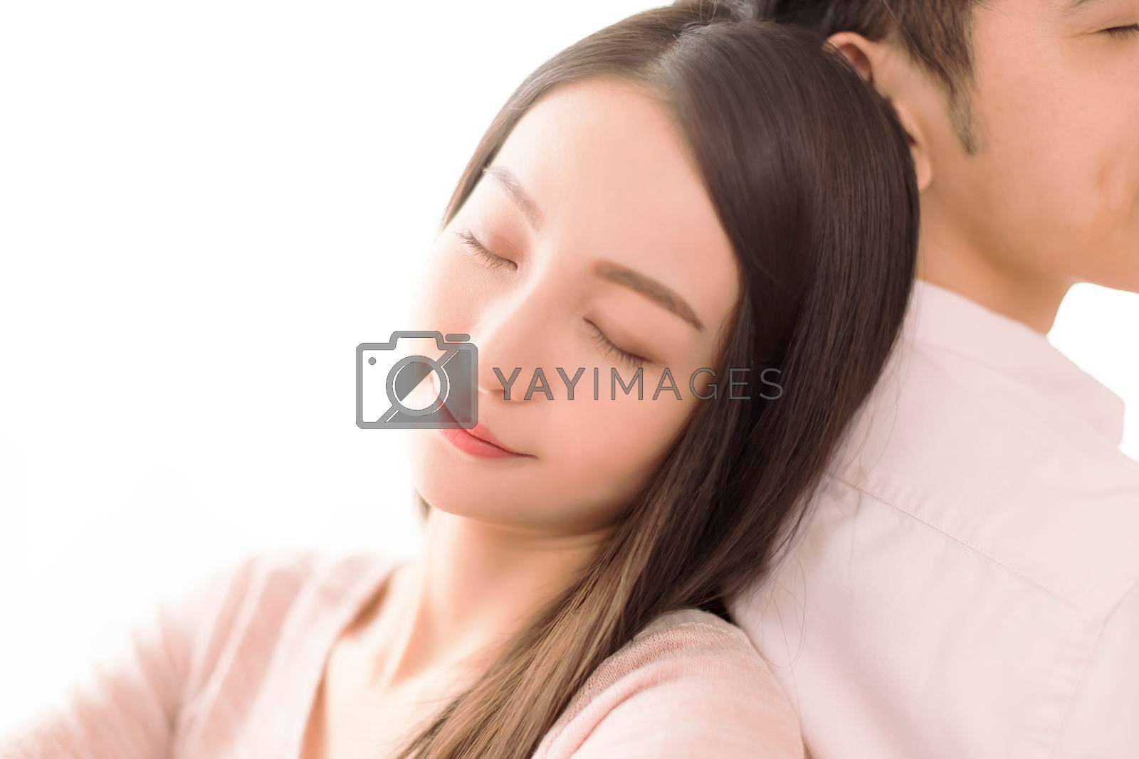 Royalty free image of Relaxed Asian  beautiful young couple by tomwang