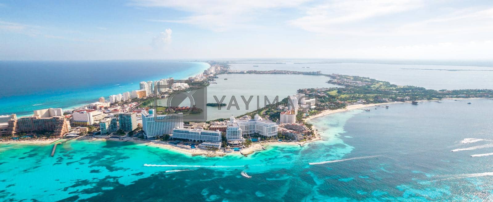 Royalty free image of Aerial panoramic view of Cancun beach and city hotel zone in Mexico. Caribbean coast landscape of Mexican resort with beach Playa Caracol and Kukulcan road. Riviera Maya in Quintana roo region on Yucatan Peninsula by Mariakray