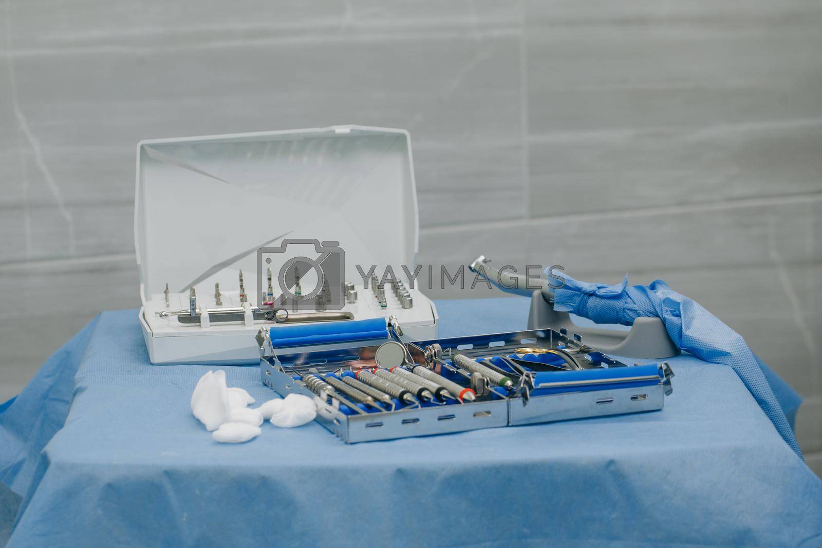 Surgical kit of instruments used in dental implantology. Dental implantation surgical set. Dentist orthopedist tools.