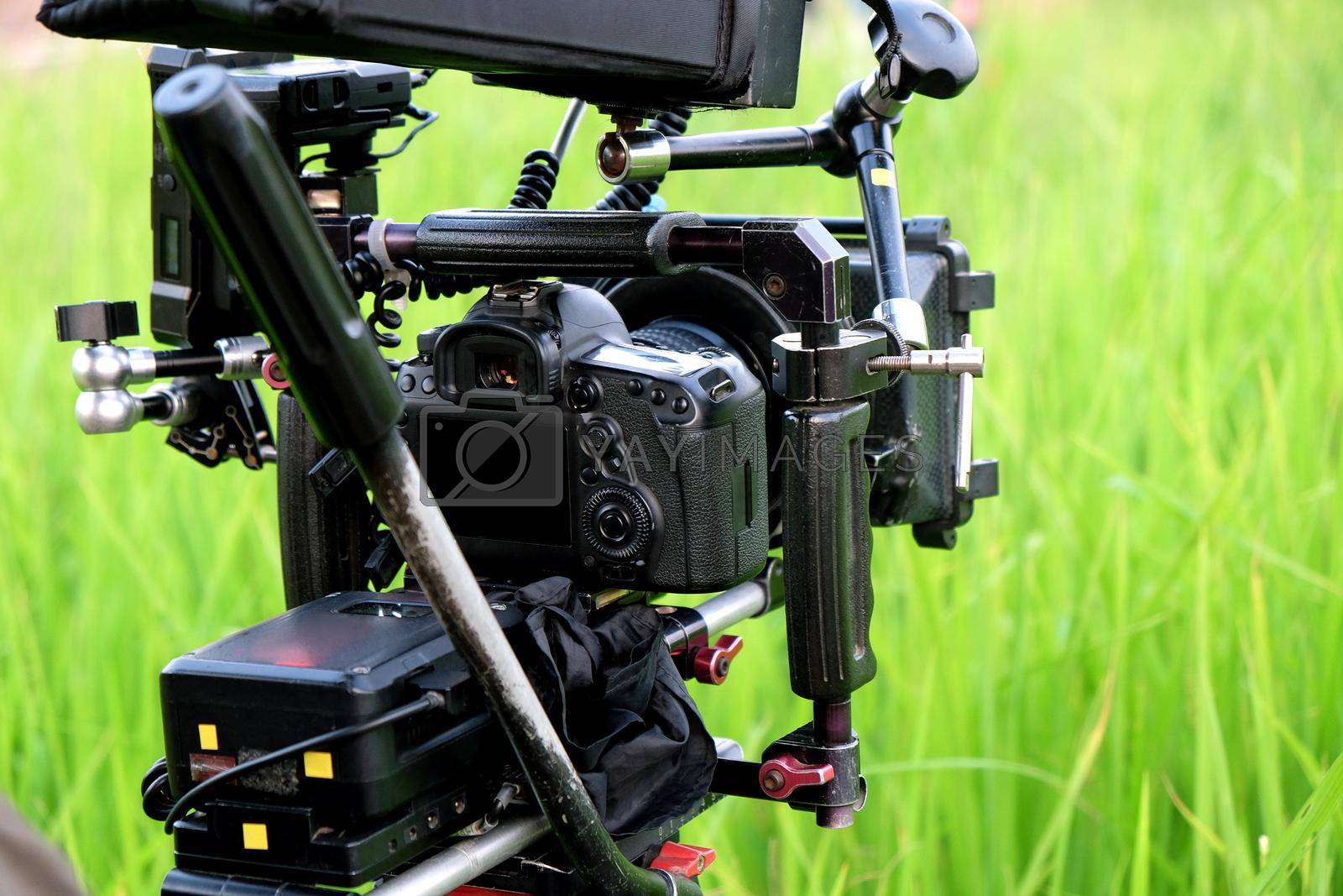 Royalty free image of professional camera on filming location by ponsulak