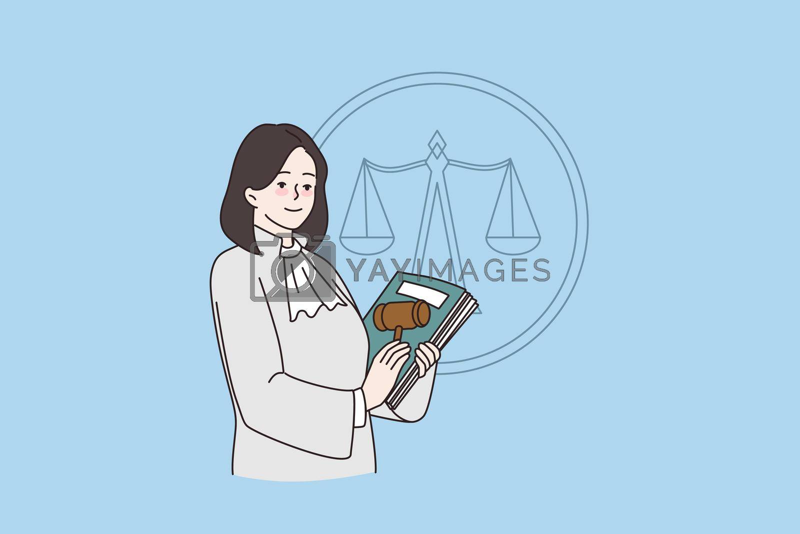 Royalty free image of Woman judge pose with constitution and gavel by Vasilyeva